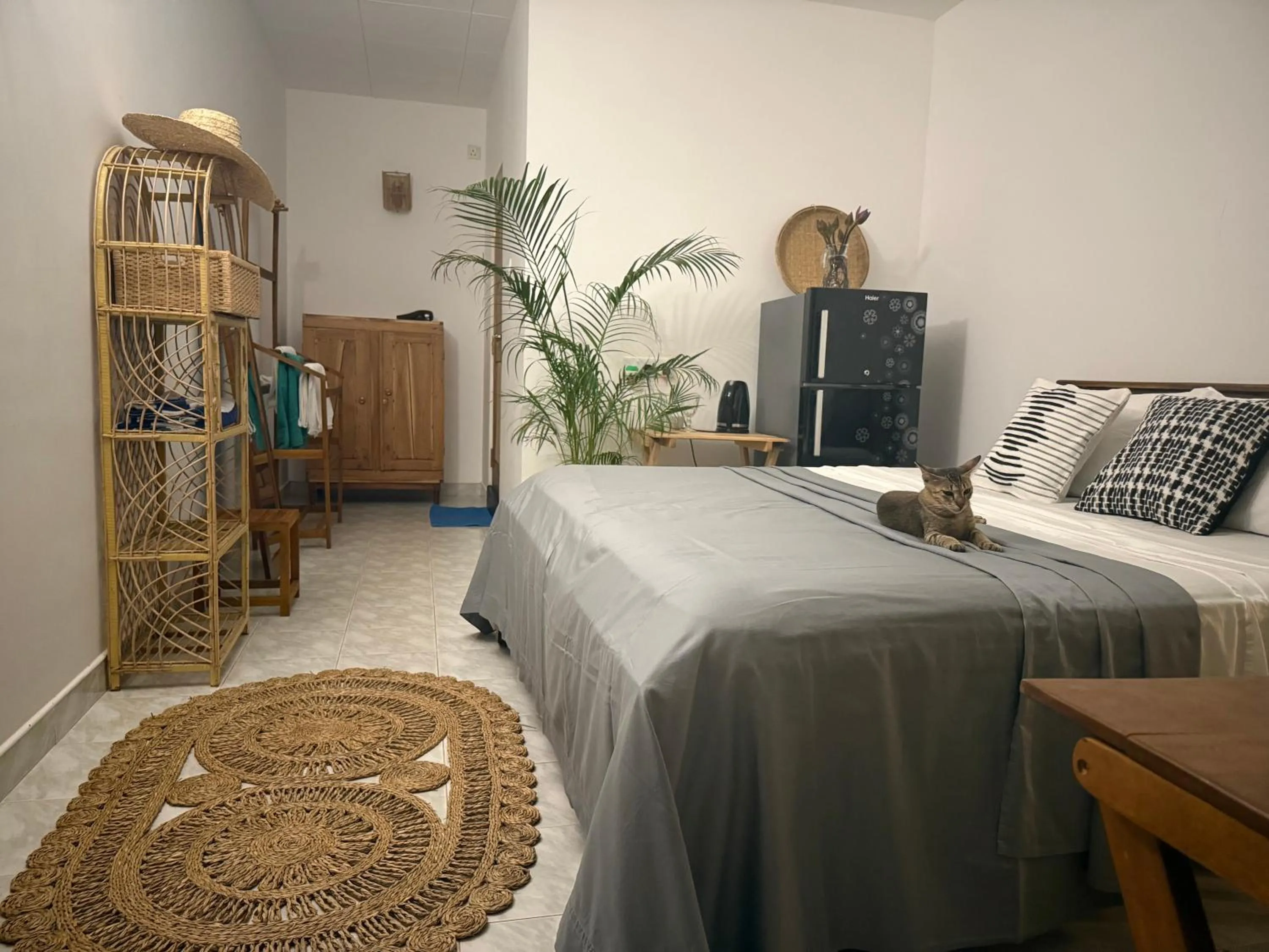 Bed in Coconut Palm beach restaurant and rooms