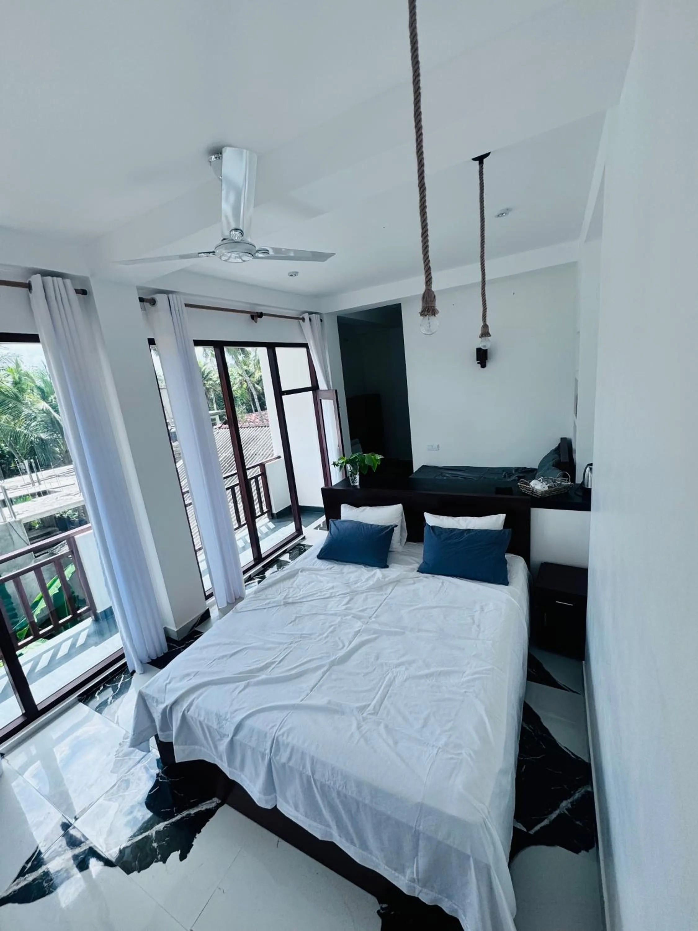 Photo of the whole room, Bed in Coconut Palm beach restaurant and rooms