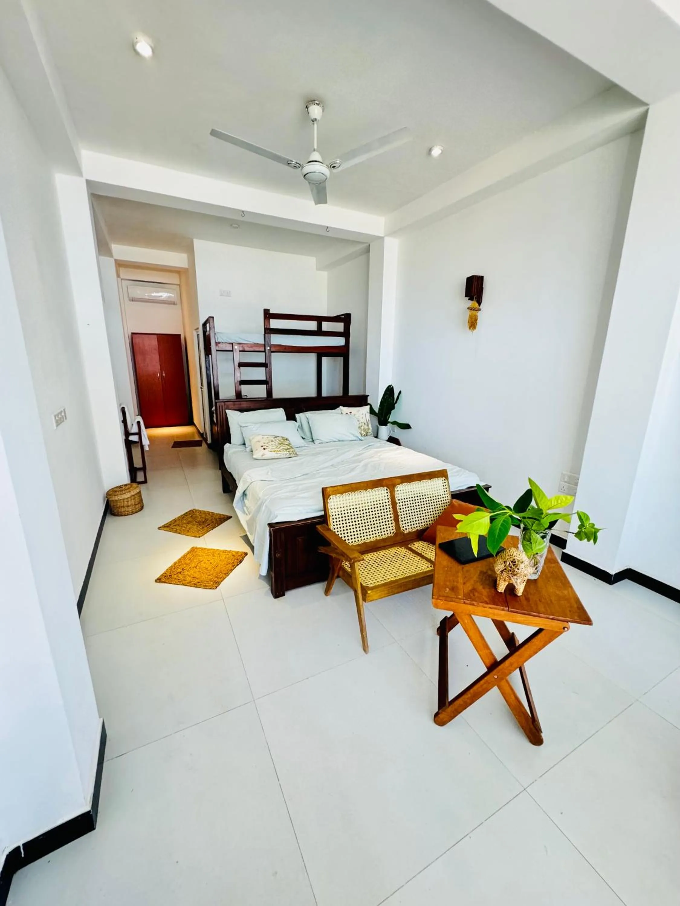 Bed in Coconut Palm beach restaurant and rooms