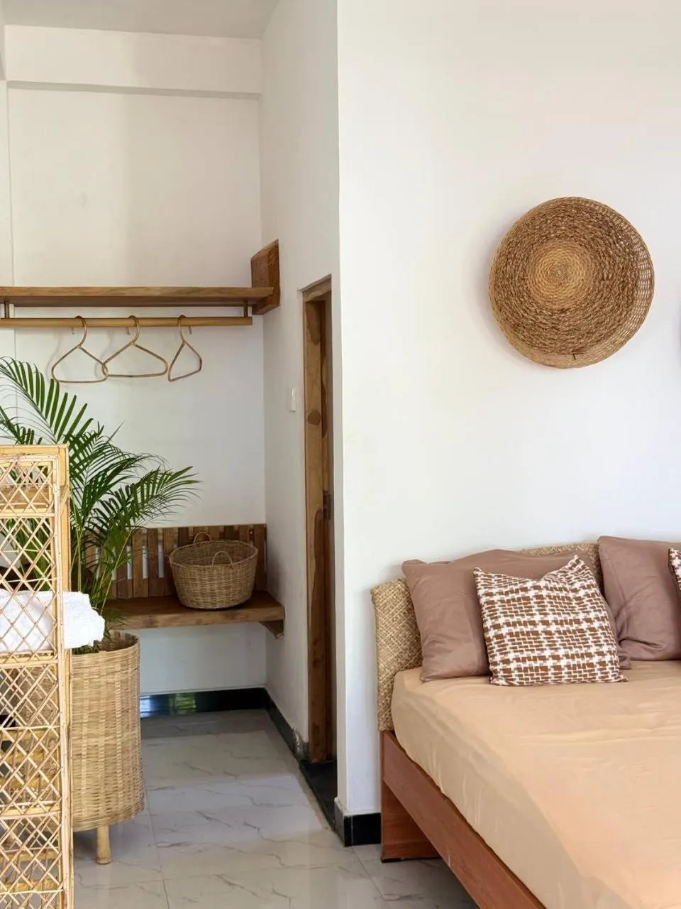 Bed in Coconut Palm beach restaurant and rooms