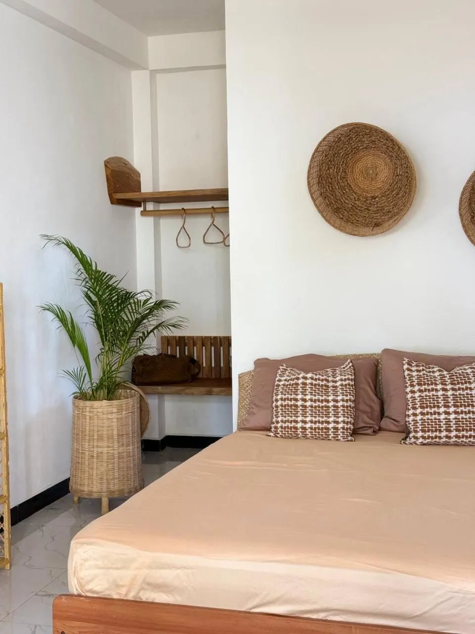 Bed in Coconut Palm beach restaurant and rooms