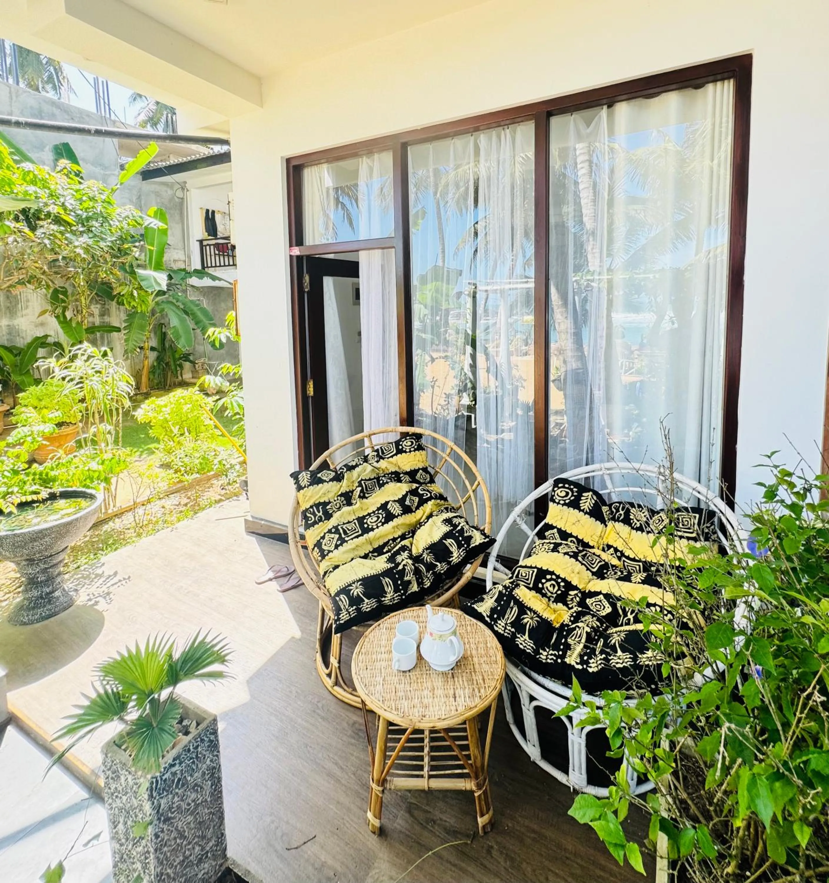 Day in Coconut Palm beach restaurant and rooms