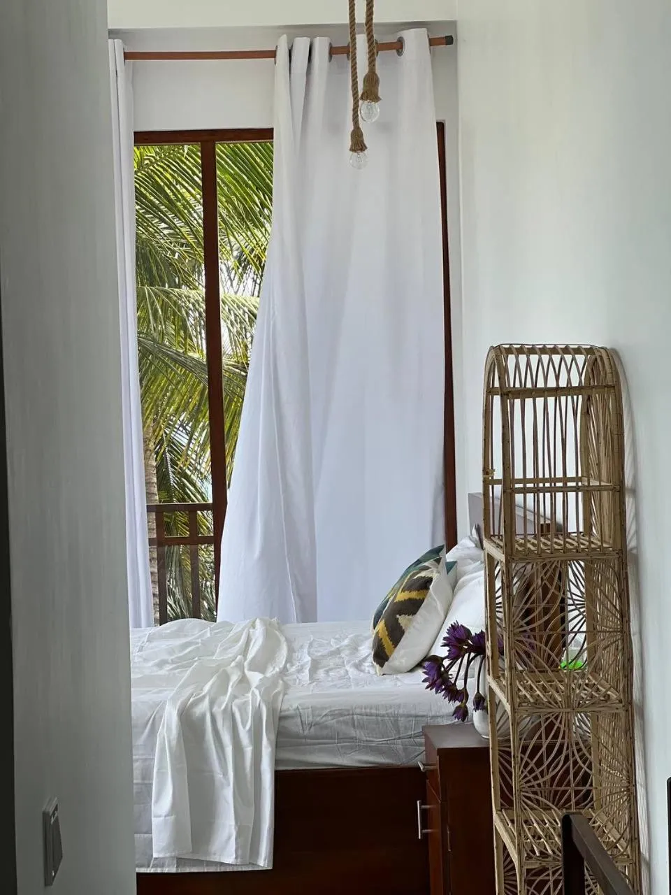 Bed in Coconut Palm beach restaurant and rooms