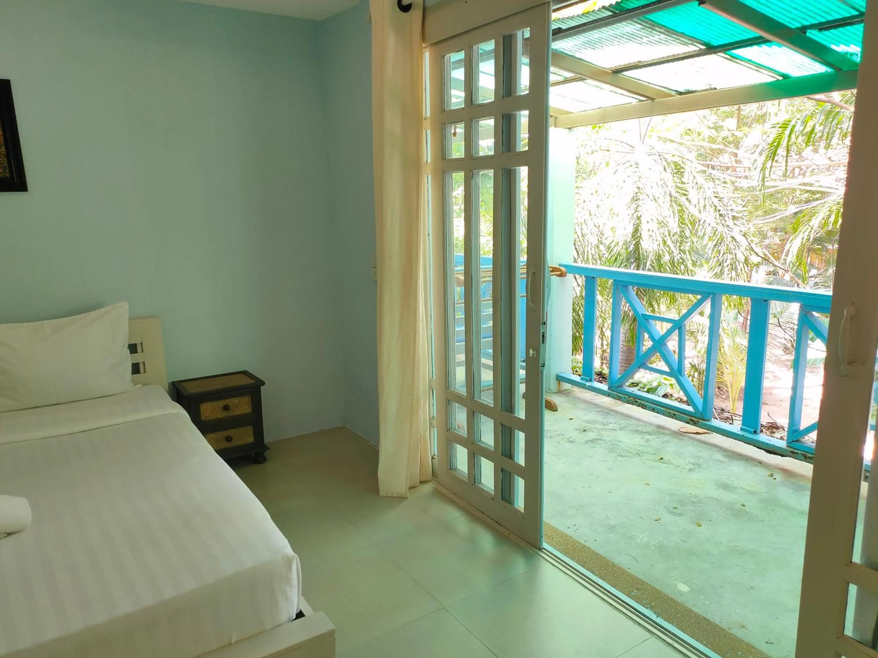 Bed in Banana Beach Resort