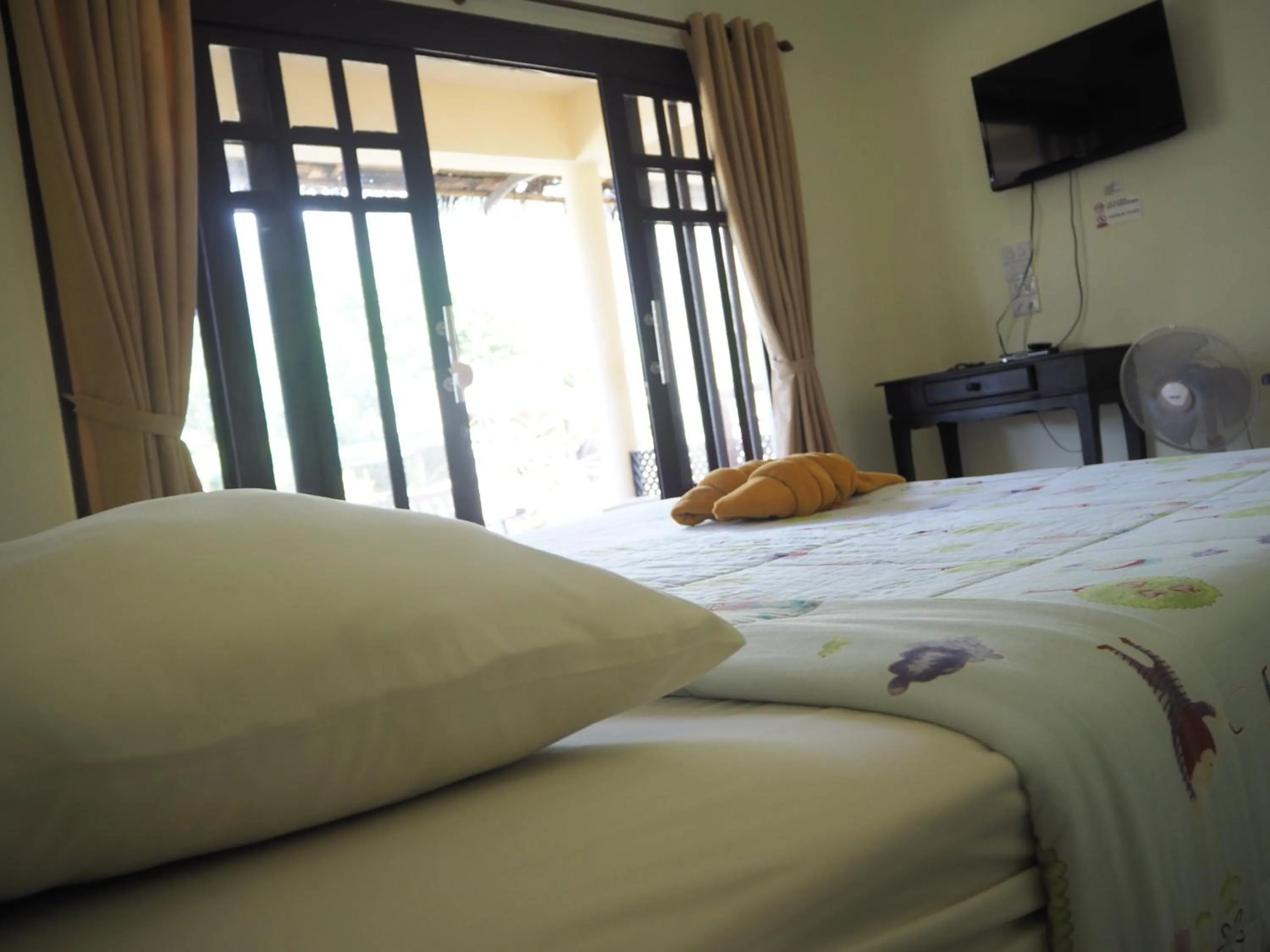Photo of the whole room, Bed in Banana Beach Resort