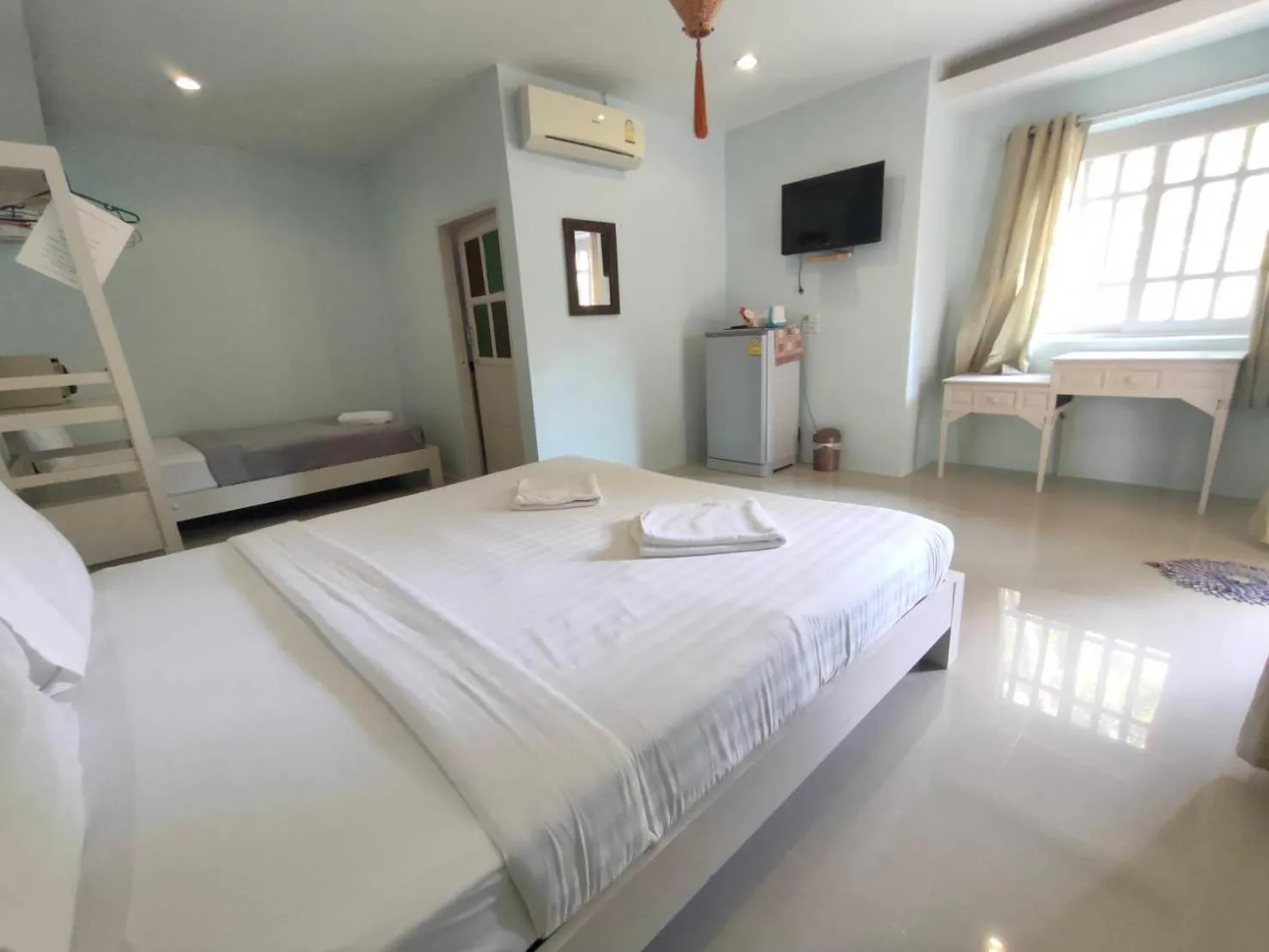 Bed in Banana Beach Resort