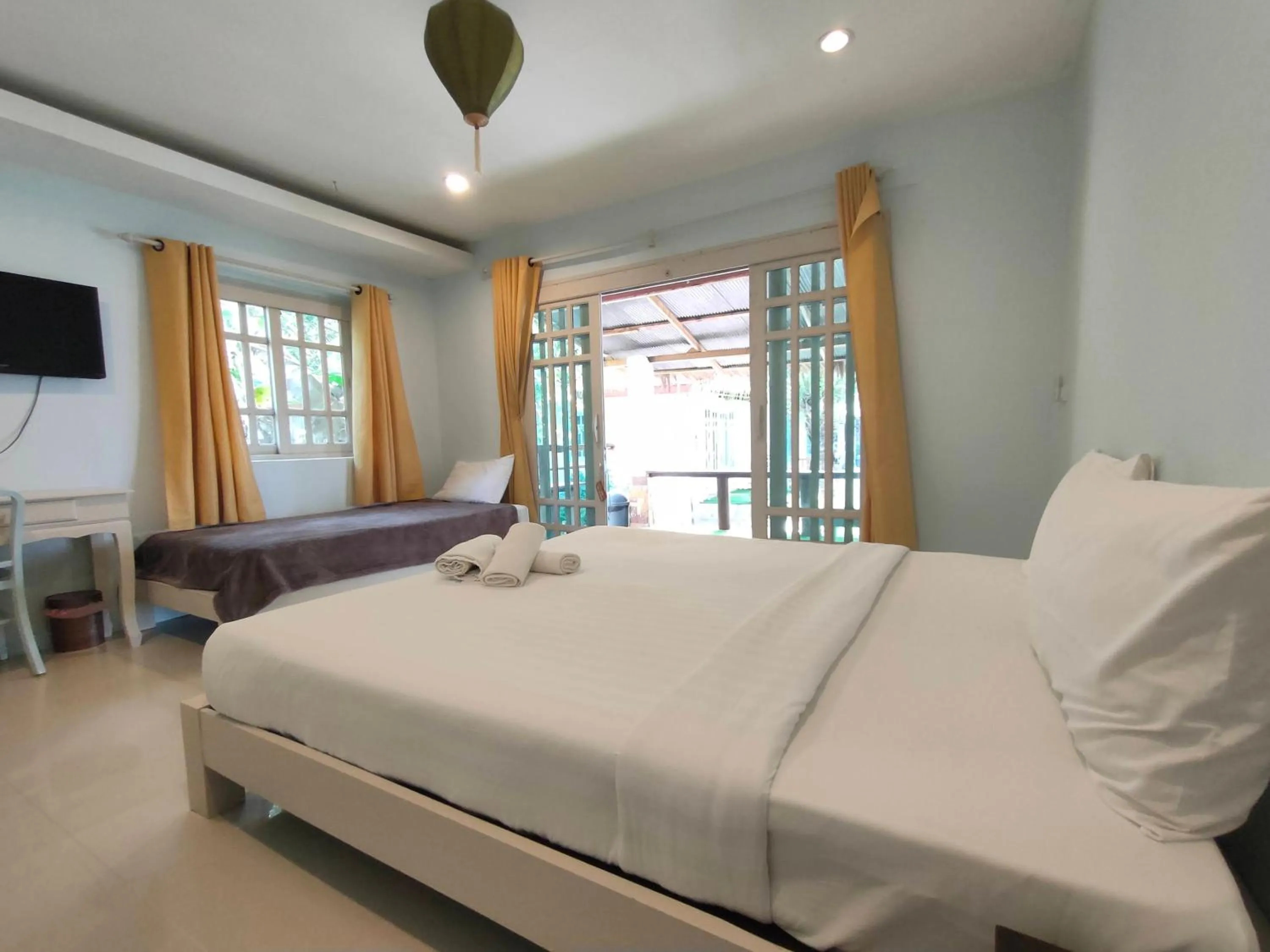 Bed in Banana Beach Resort