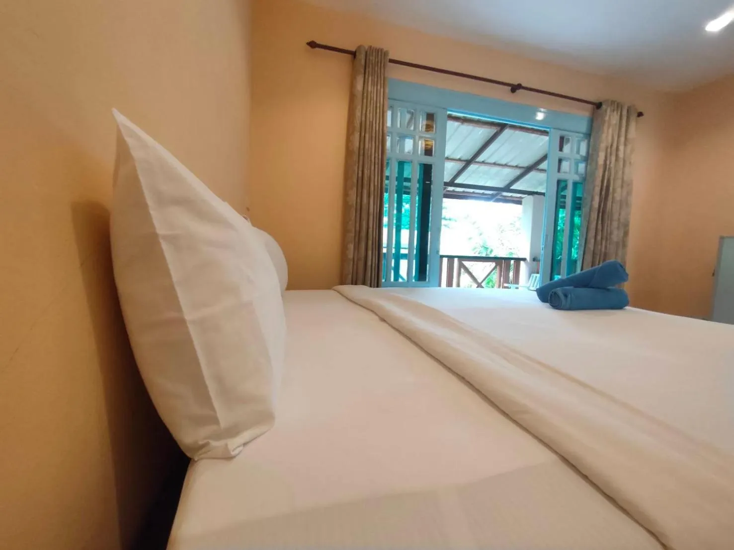 Bed in Banana Beach Resort