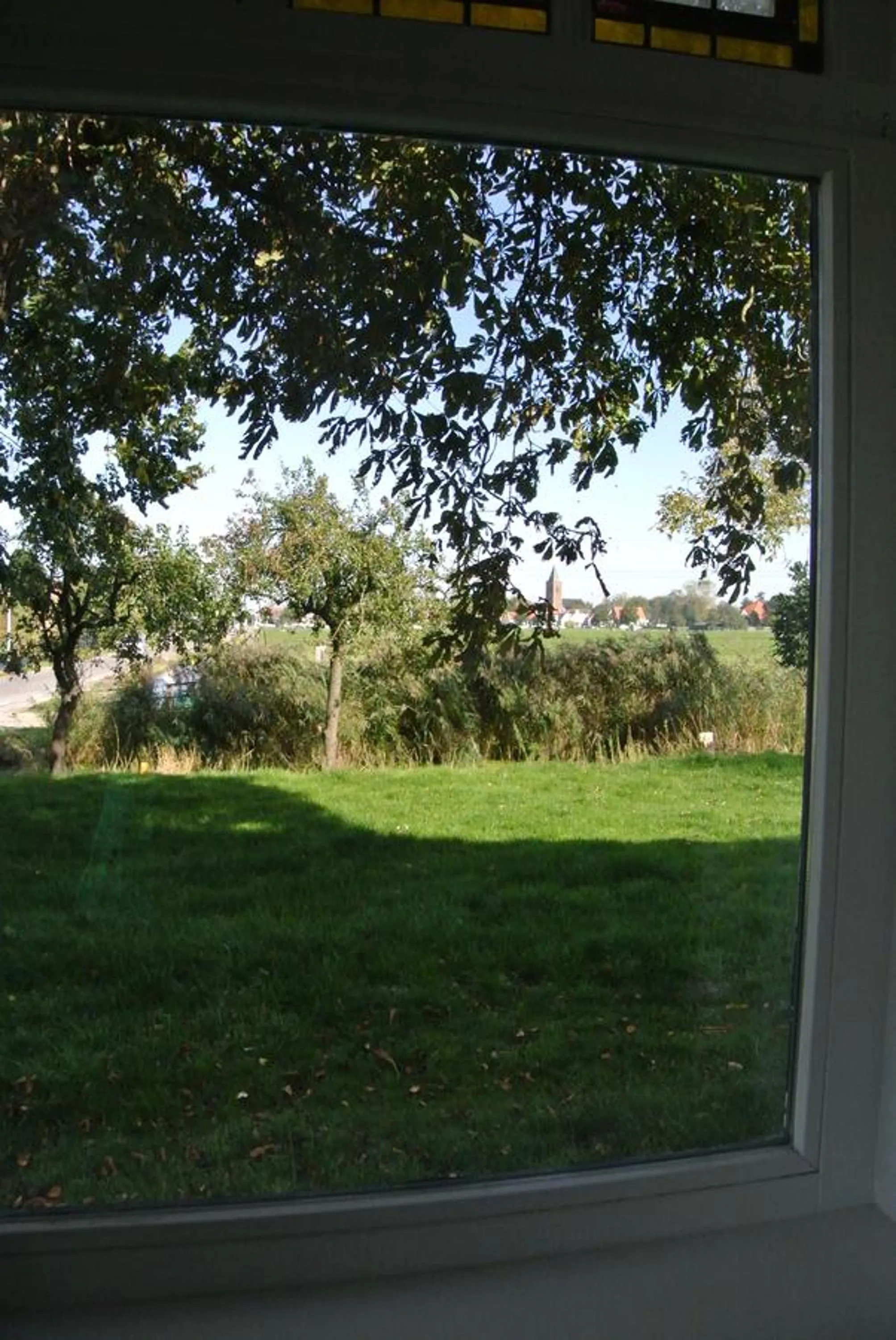 Garden view in Appartement Voorhuis en chalet Klein Waterland