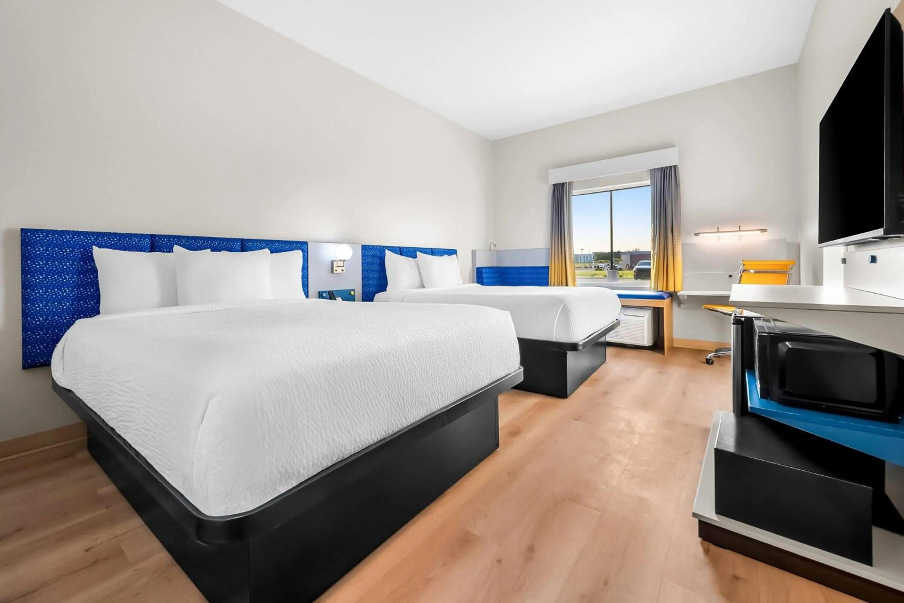 Bed in Microtel Inn & Suites by Wyndham Prattville Montgomery