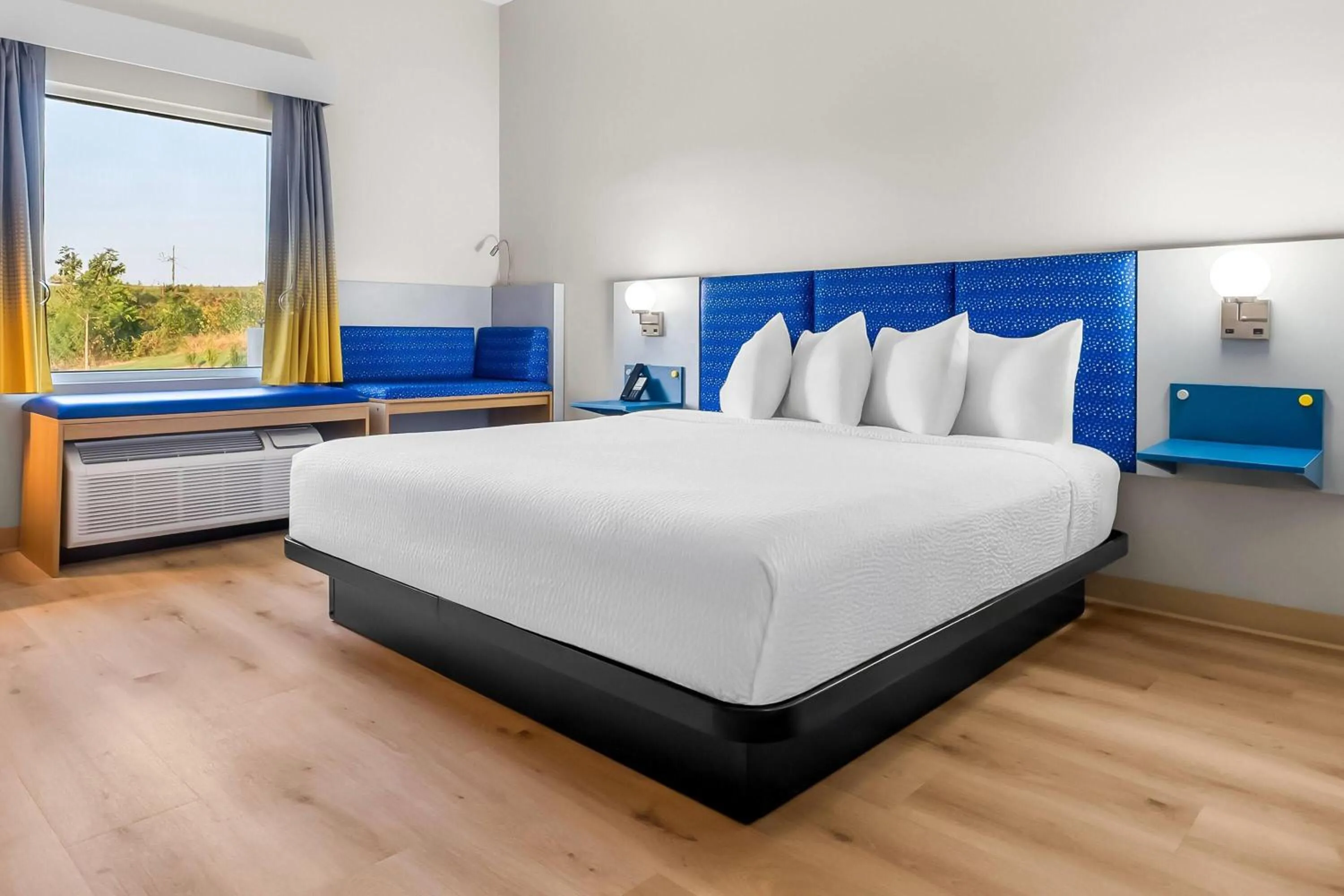 Bed in Microtel Inn & Suites by Wyndham Prattville Montgomery