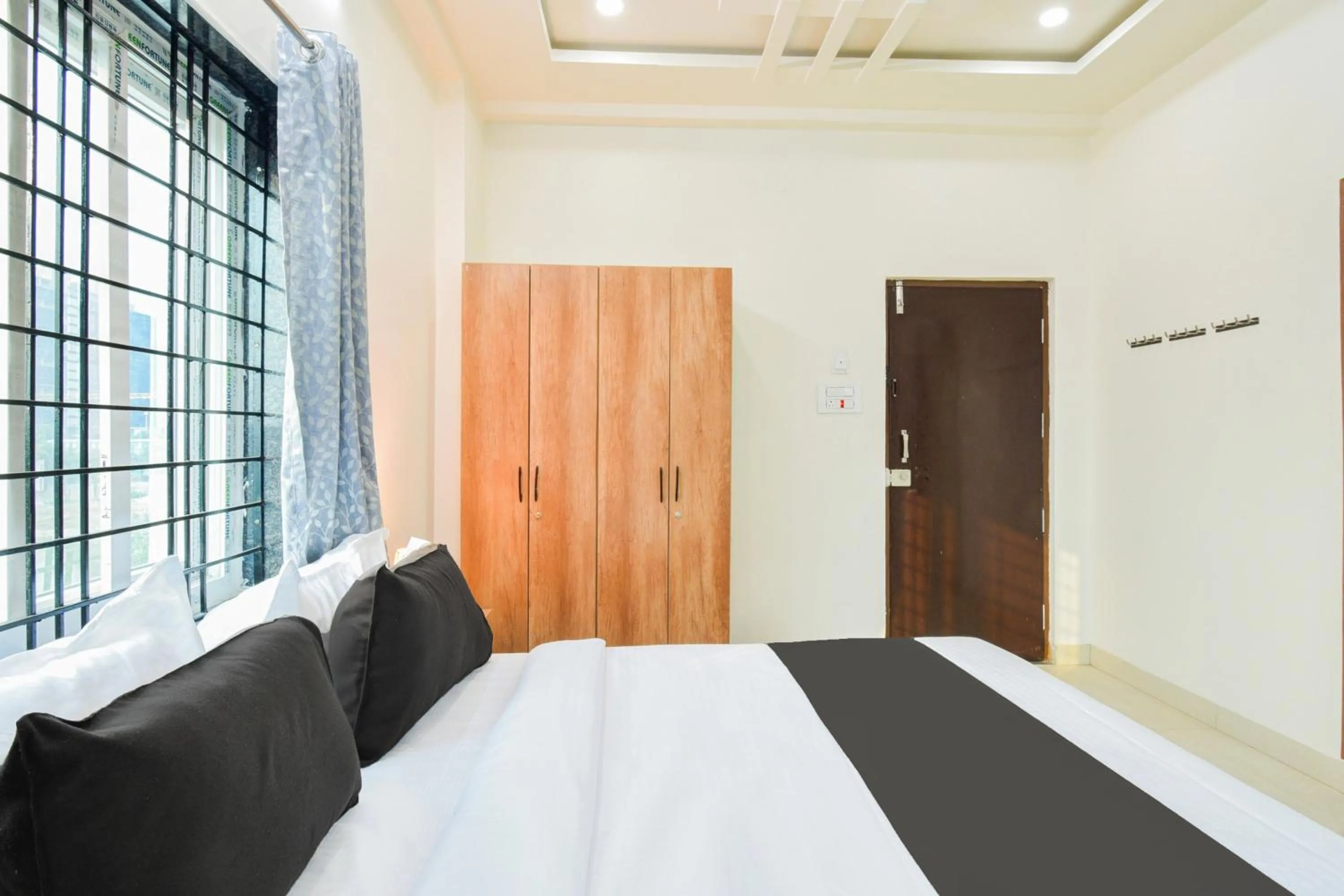 Bedroom, Bed in Super Townhouse Kokapet Formerly Aarian Tej Nilayam