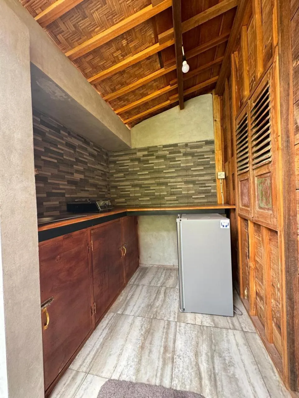 Kitchen or kitchenette in Oemah Kangin Homestay