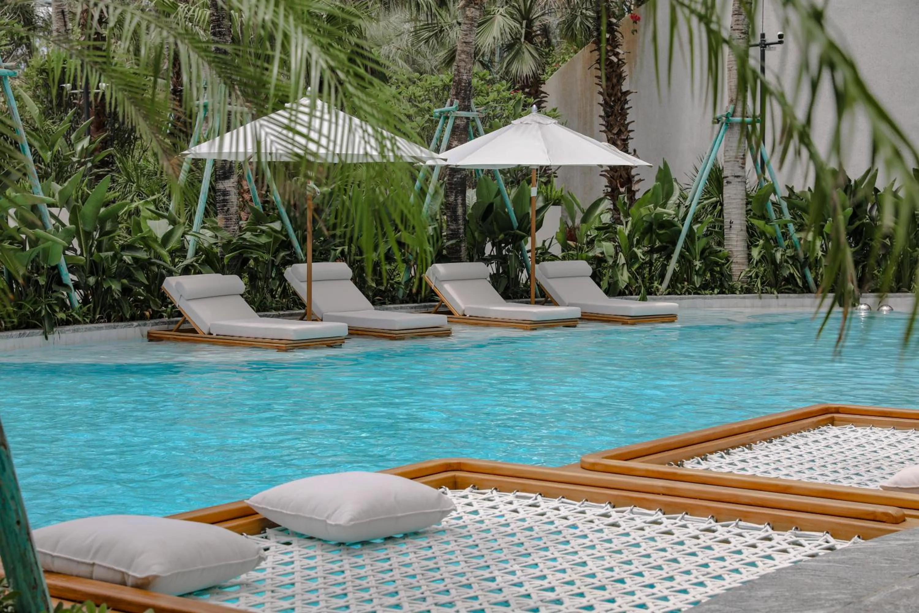 Pool view in Kimpton Aqeos Hainan by IHG