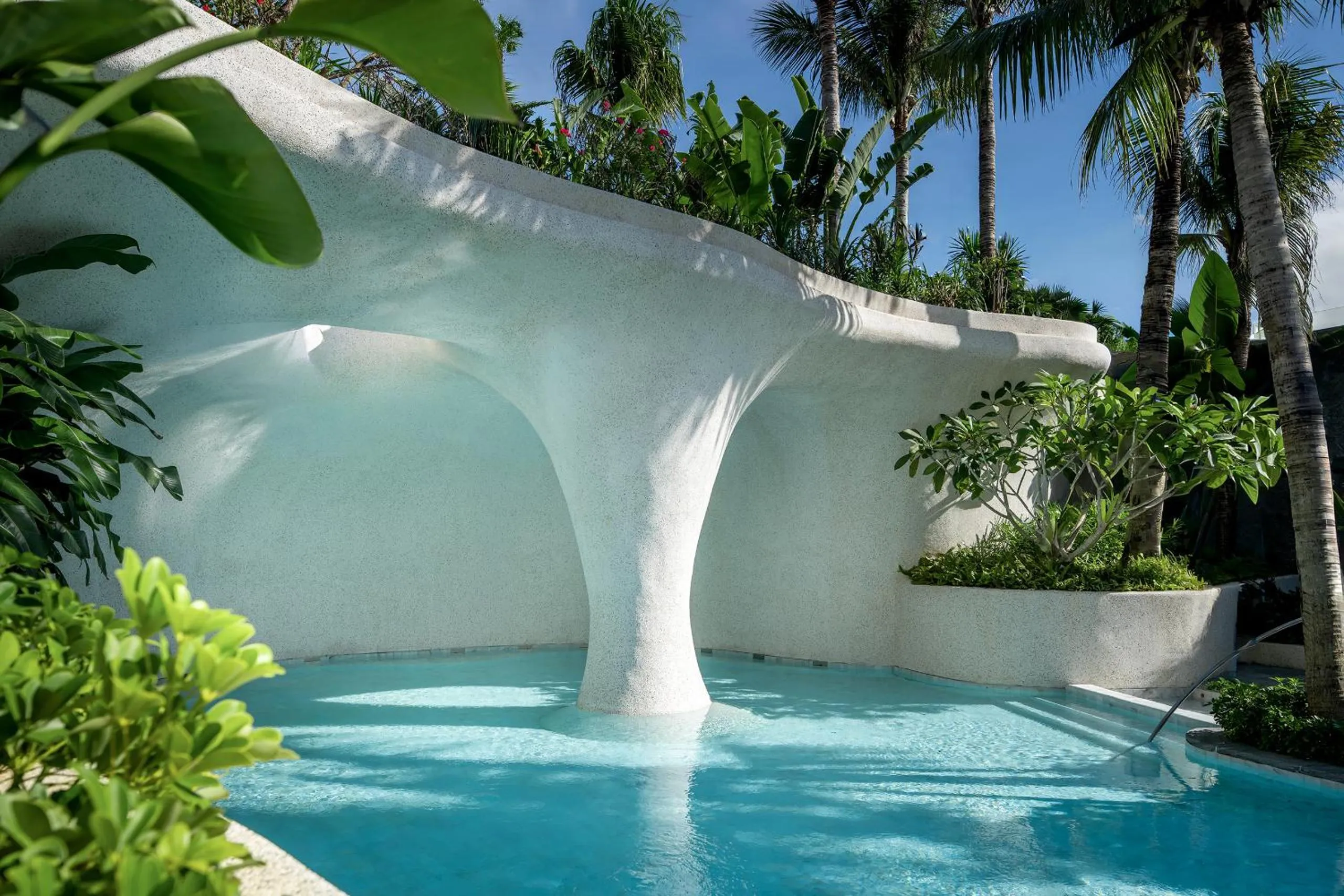 Swimming pool in Kimpton Aqeos Hainan by IHG