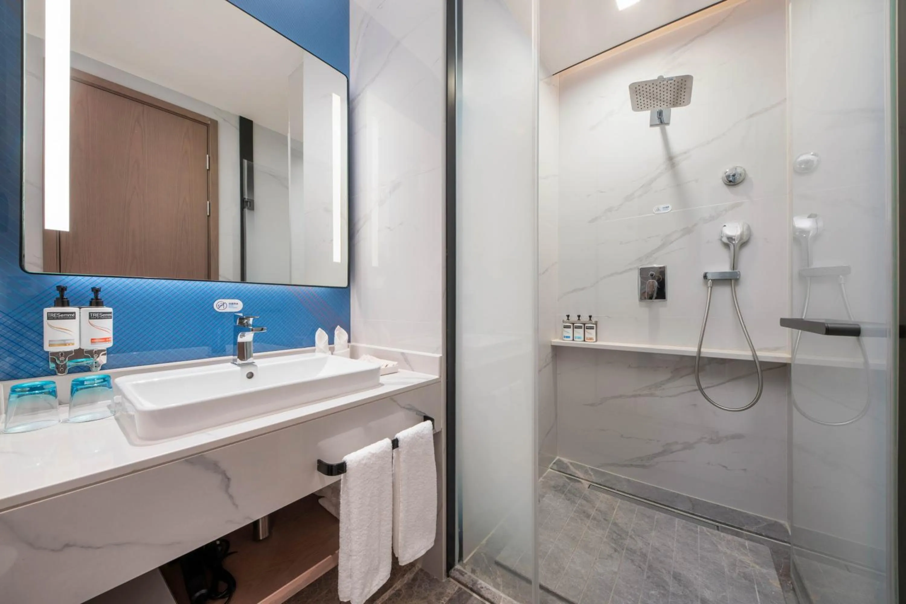 Bathroom in Holiday Inn Express Wuxi Xishan by IHG