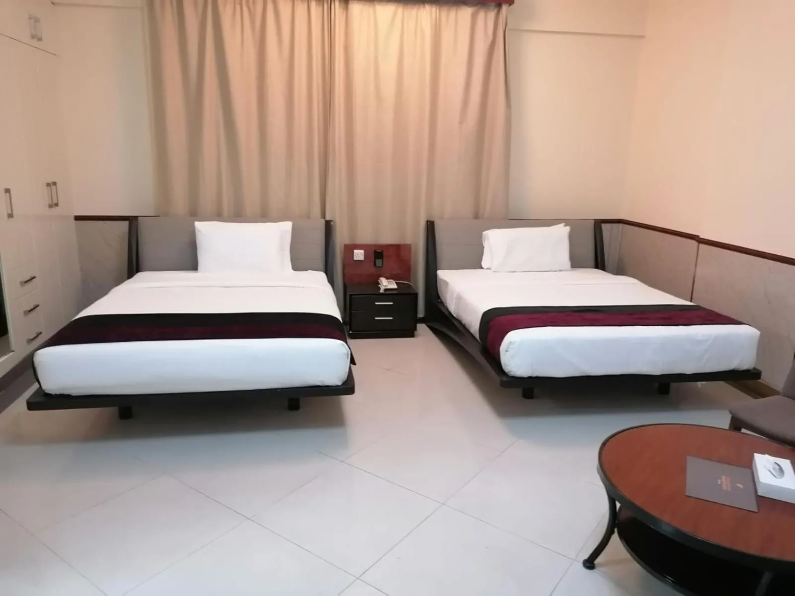 Bed in Claridge Star Hotel