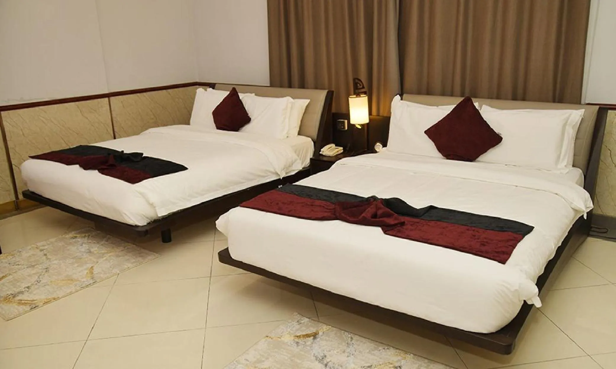 Bed in Claridge Star Hotel