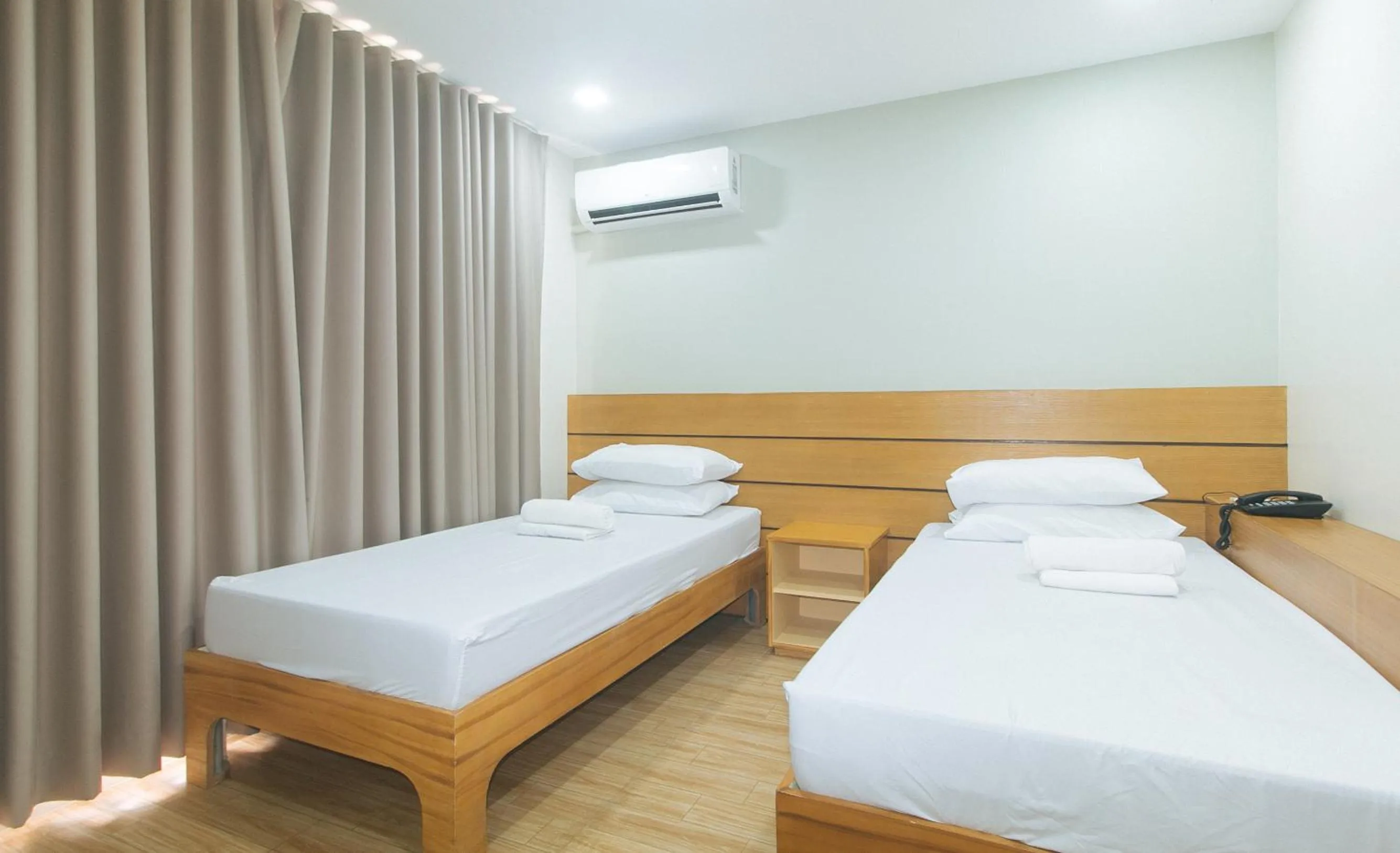 Bed in Avelida Homes by RedDoorz