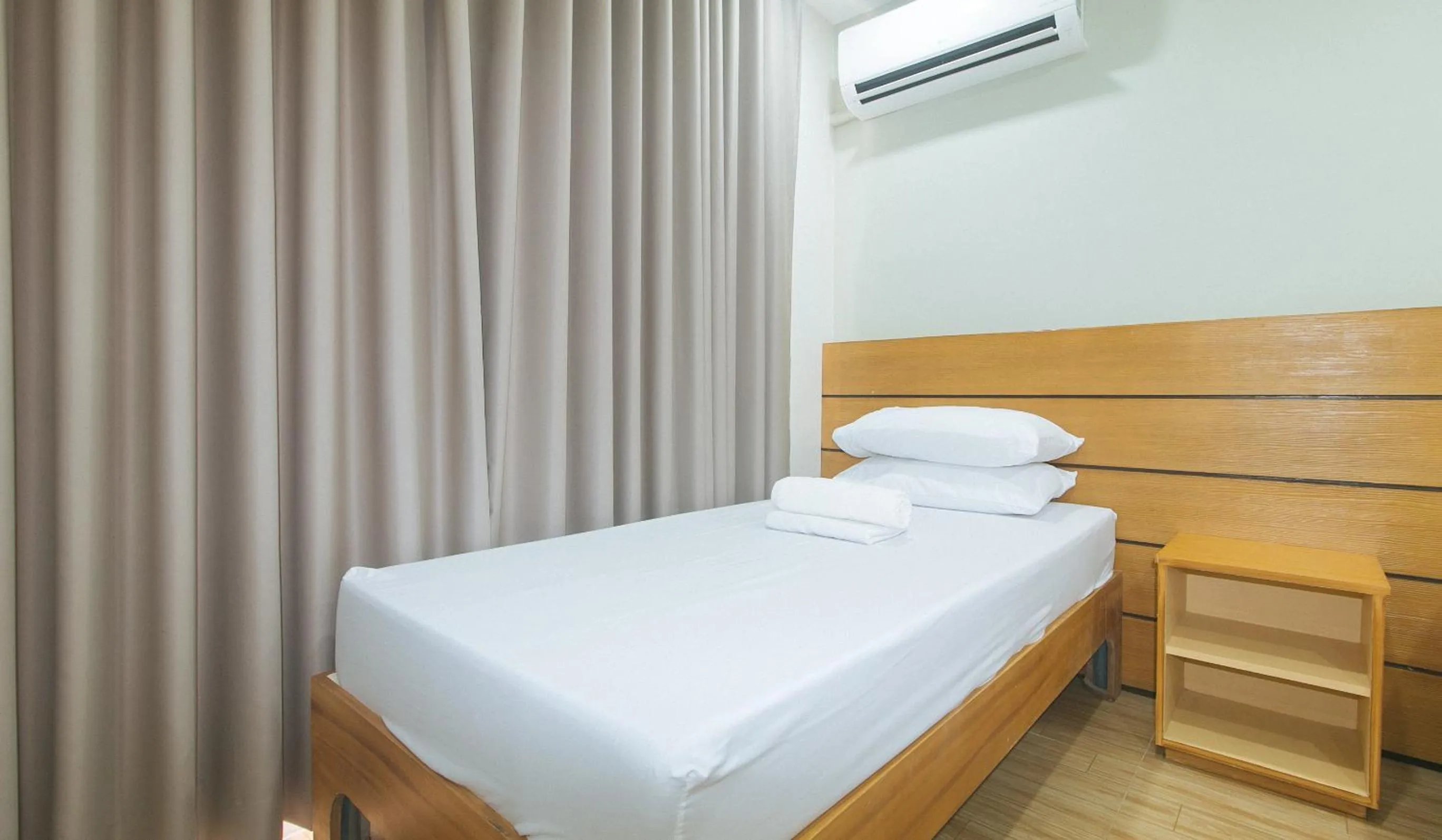 Bed in Avelida Homes by RedDoorz