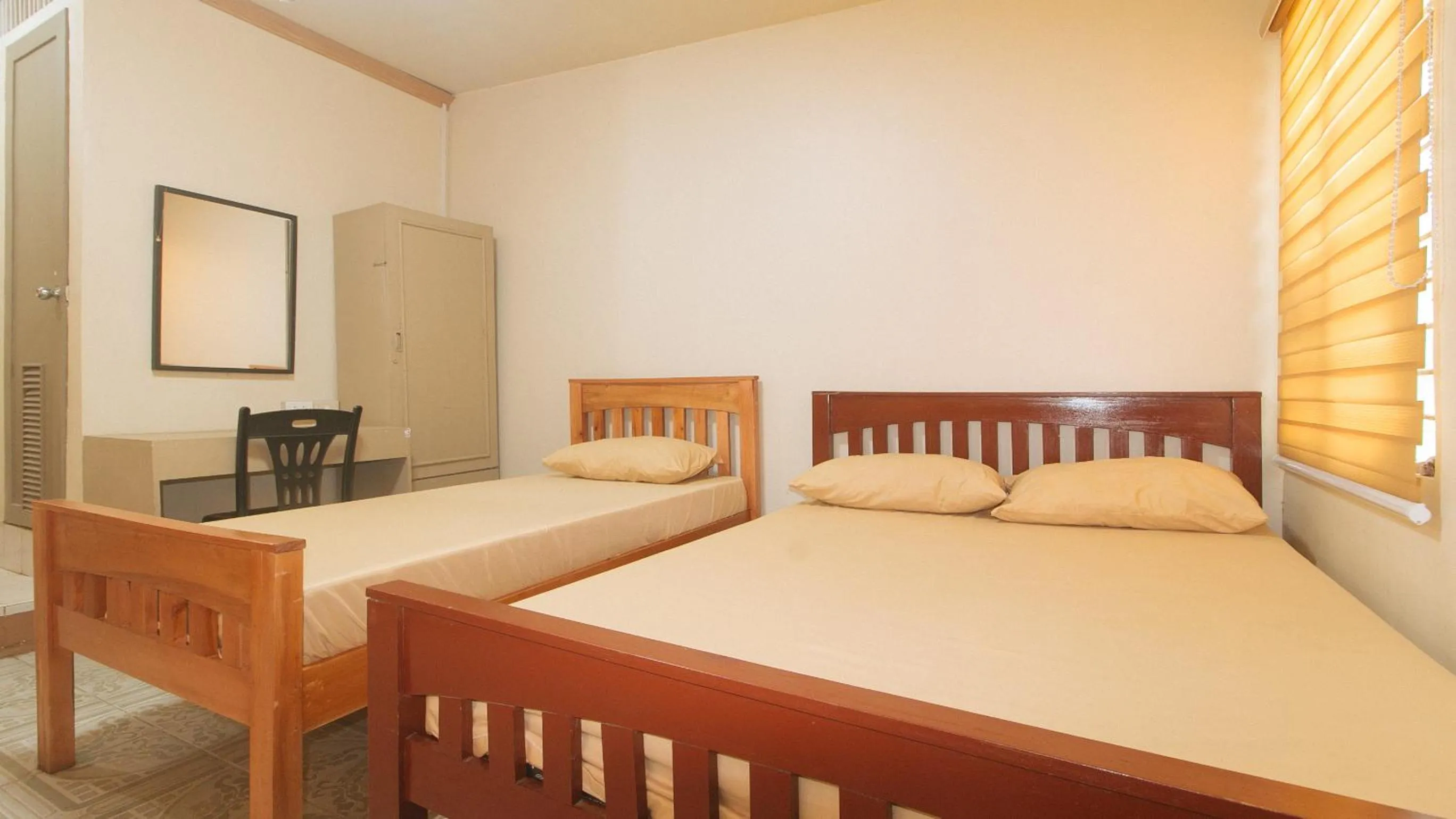 Bedroom, Bed in Kababayan Pensione House by RedDoorz