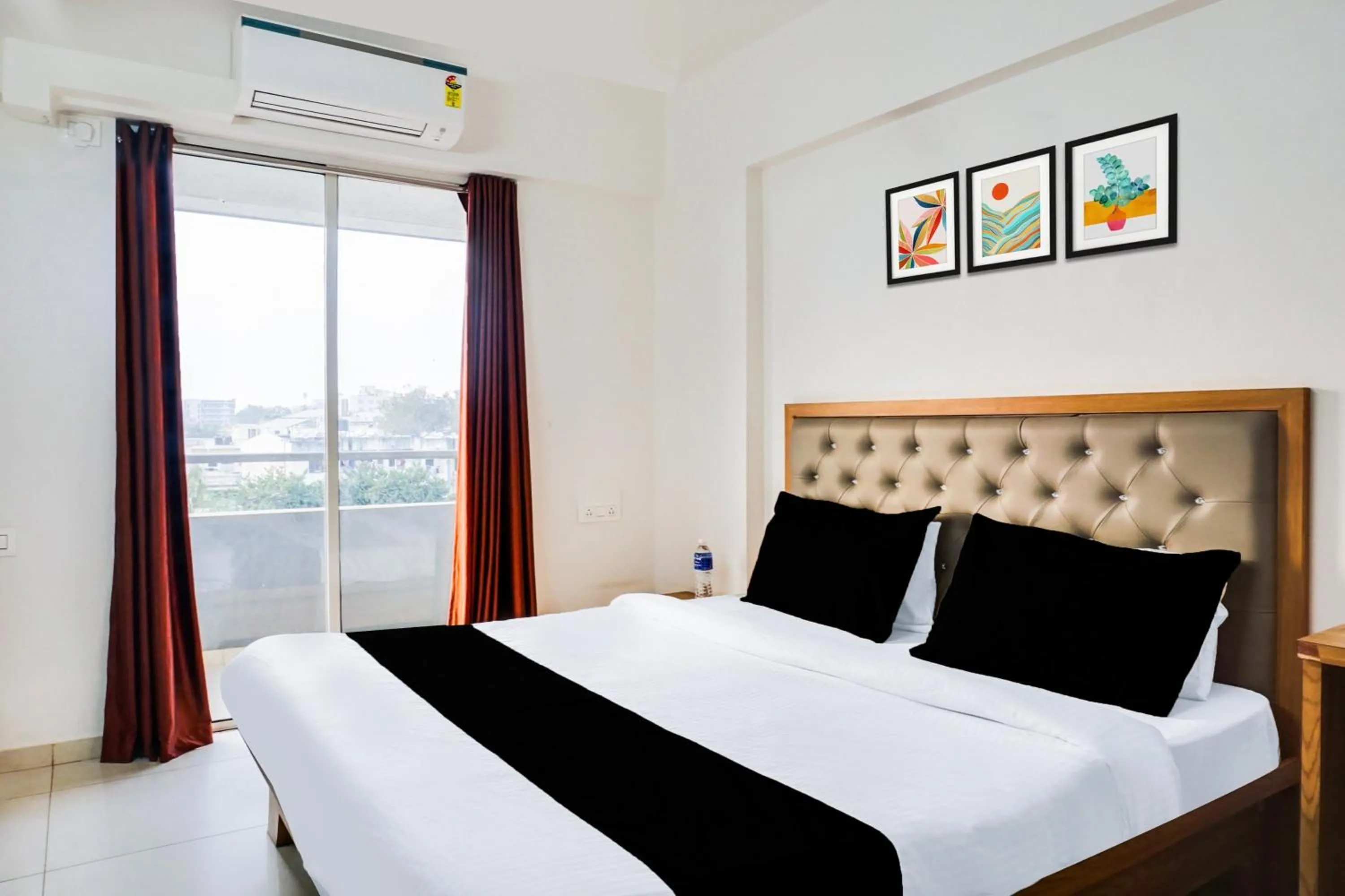 Bedroom, Bed in Super Townhouse Lohegaon Near Pune Airport formerly Landmark Regency