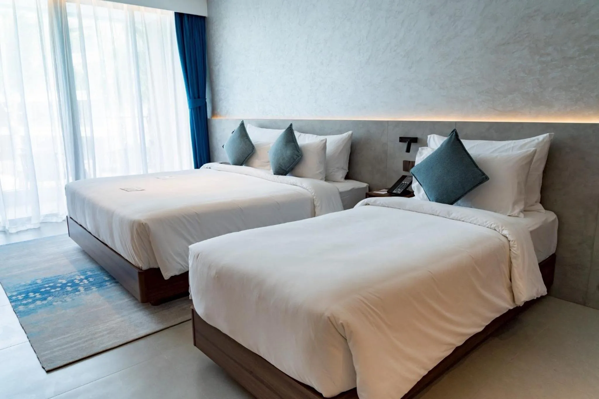 Bed in Kora Beach Resort Phuket