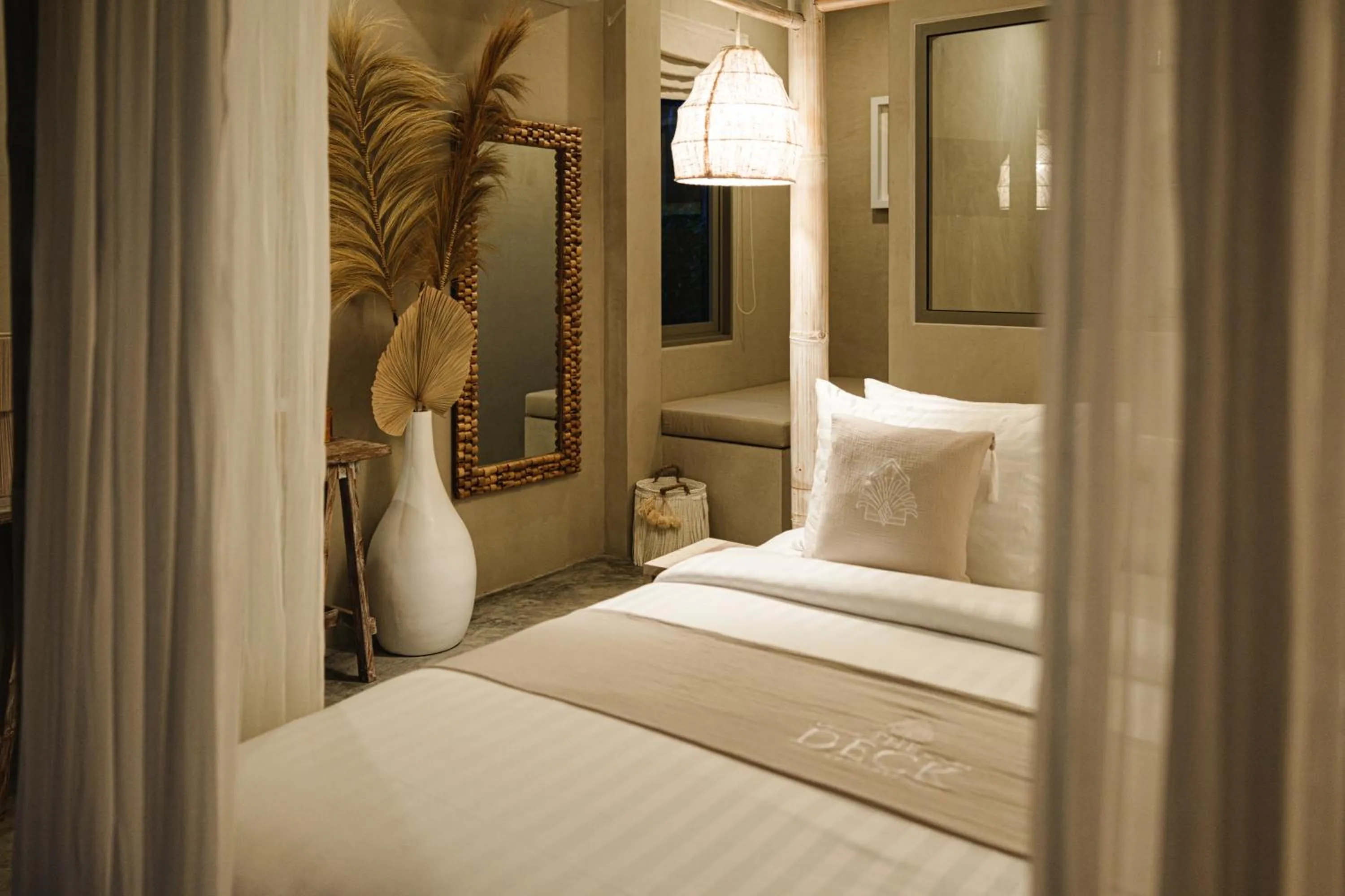 Bed in The Deck Cottages Samui