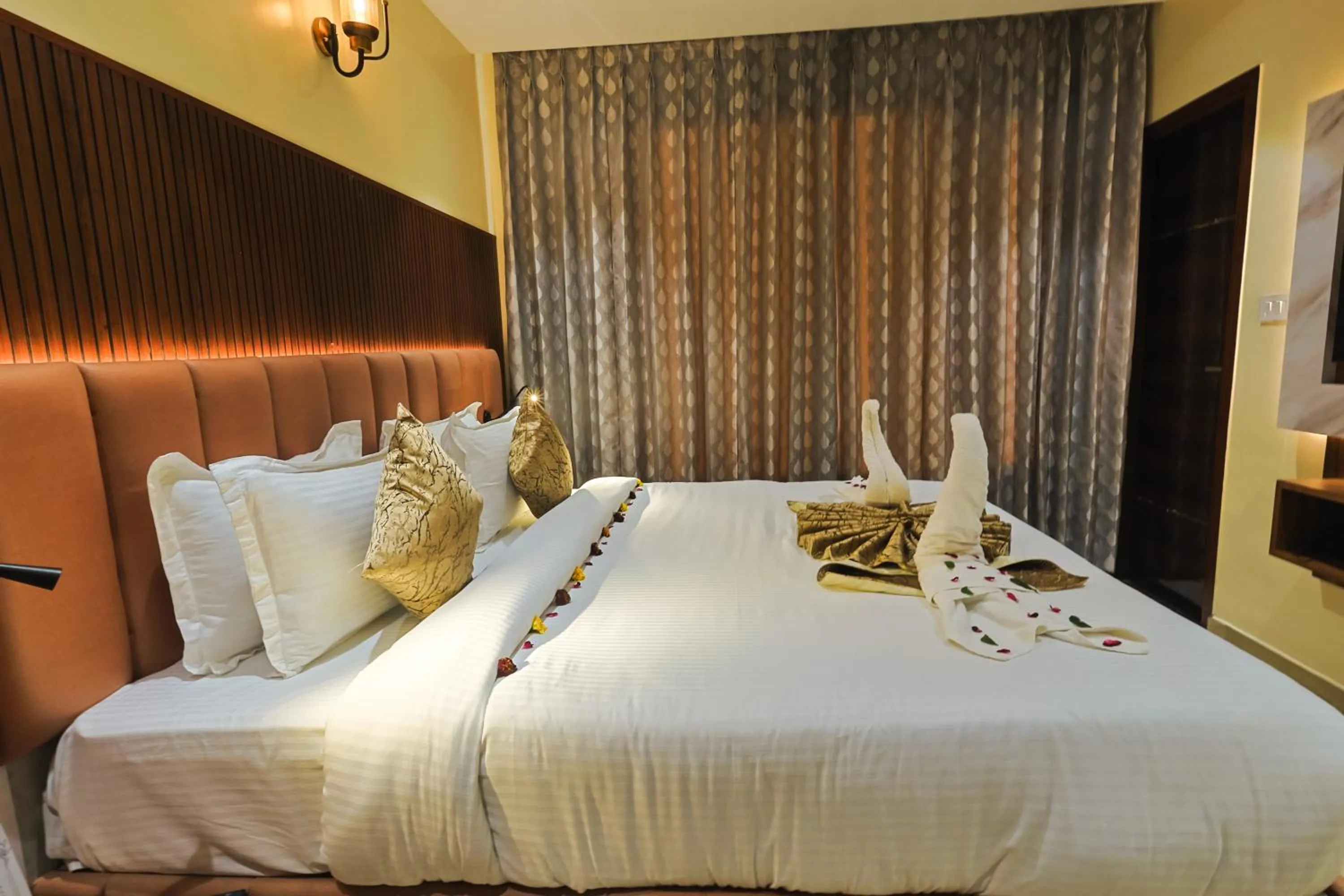 Bed in Hotel Vishwam Residency
