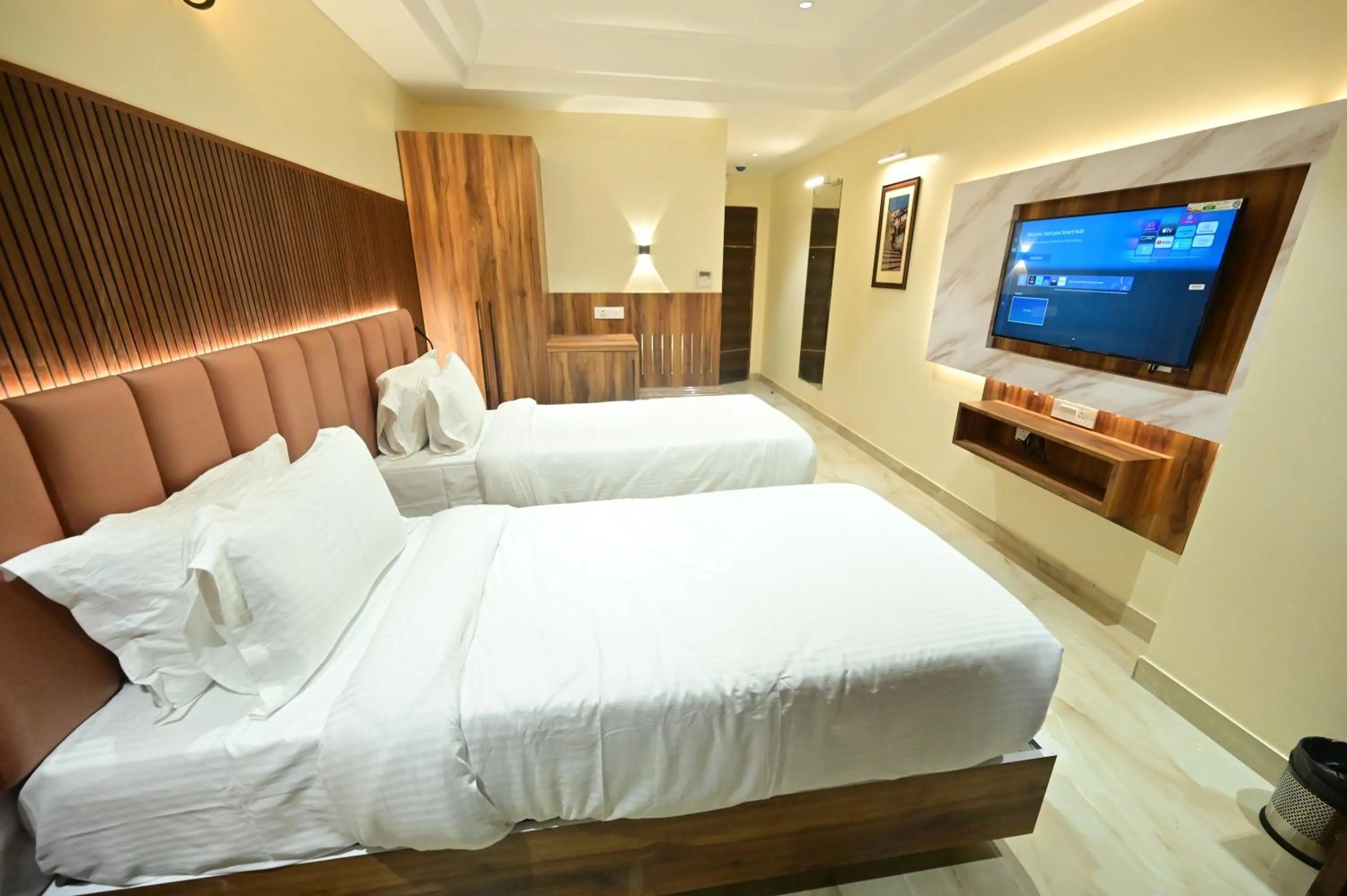 Bed in Hotel Vishwam Residency