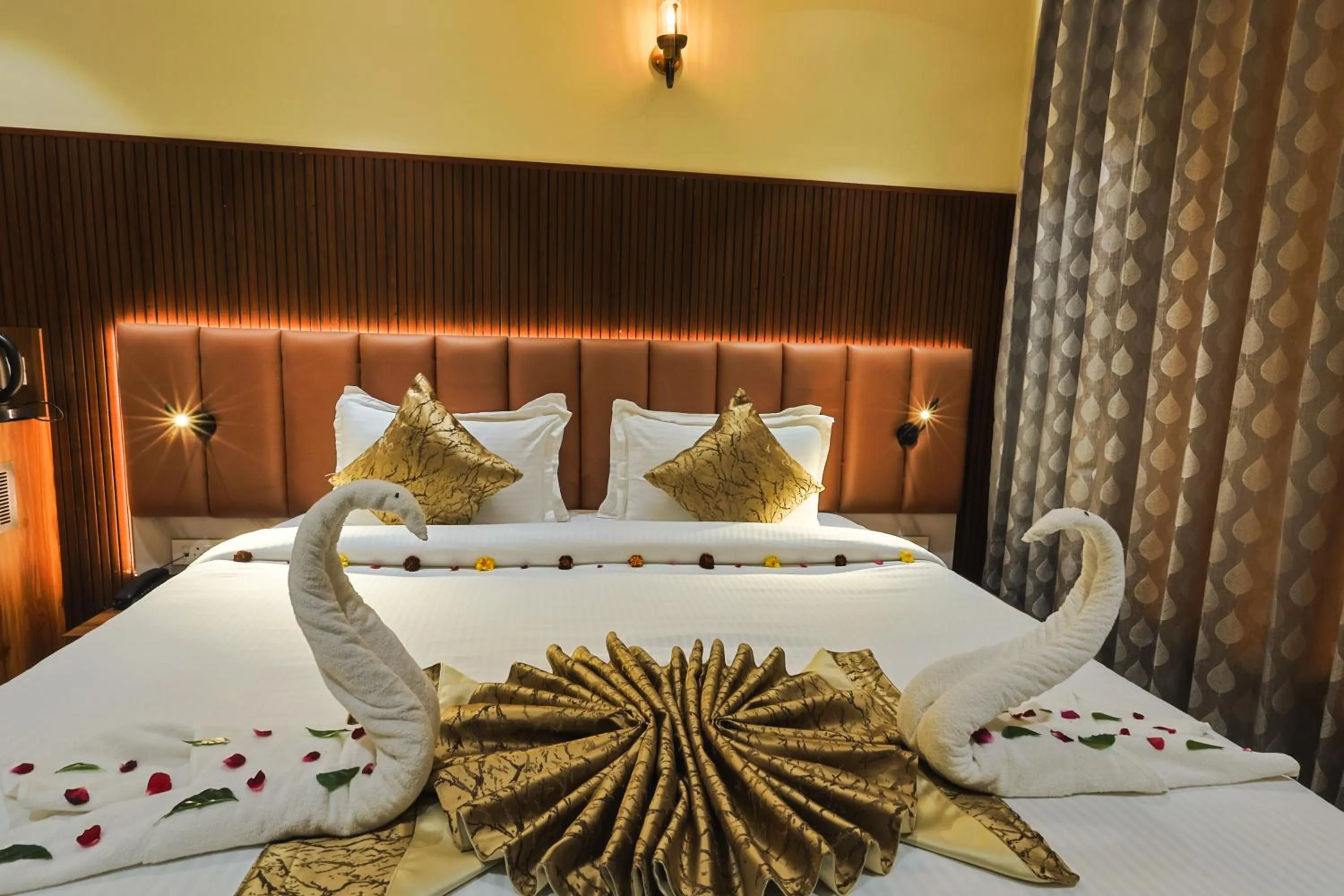 Bed in Hotel Vishwam Residency