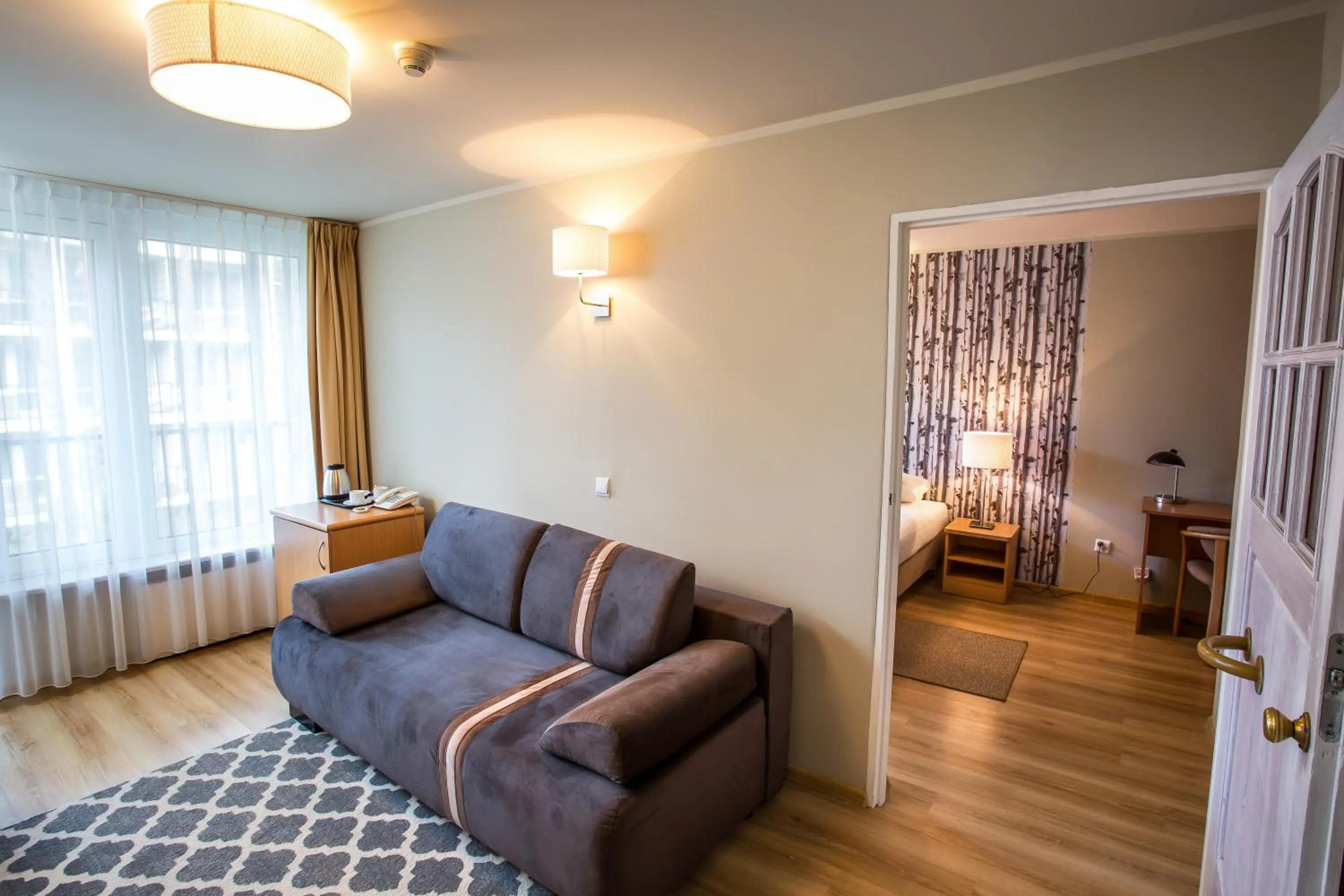 Living room, Bed in Hotel Orle