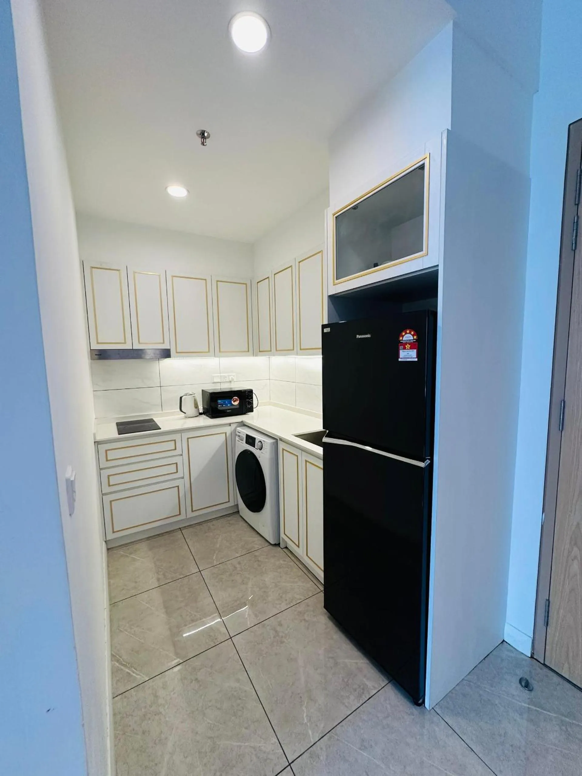 Kitchen or kitchenette in The Axon Apartment Bukit Bintang