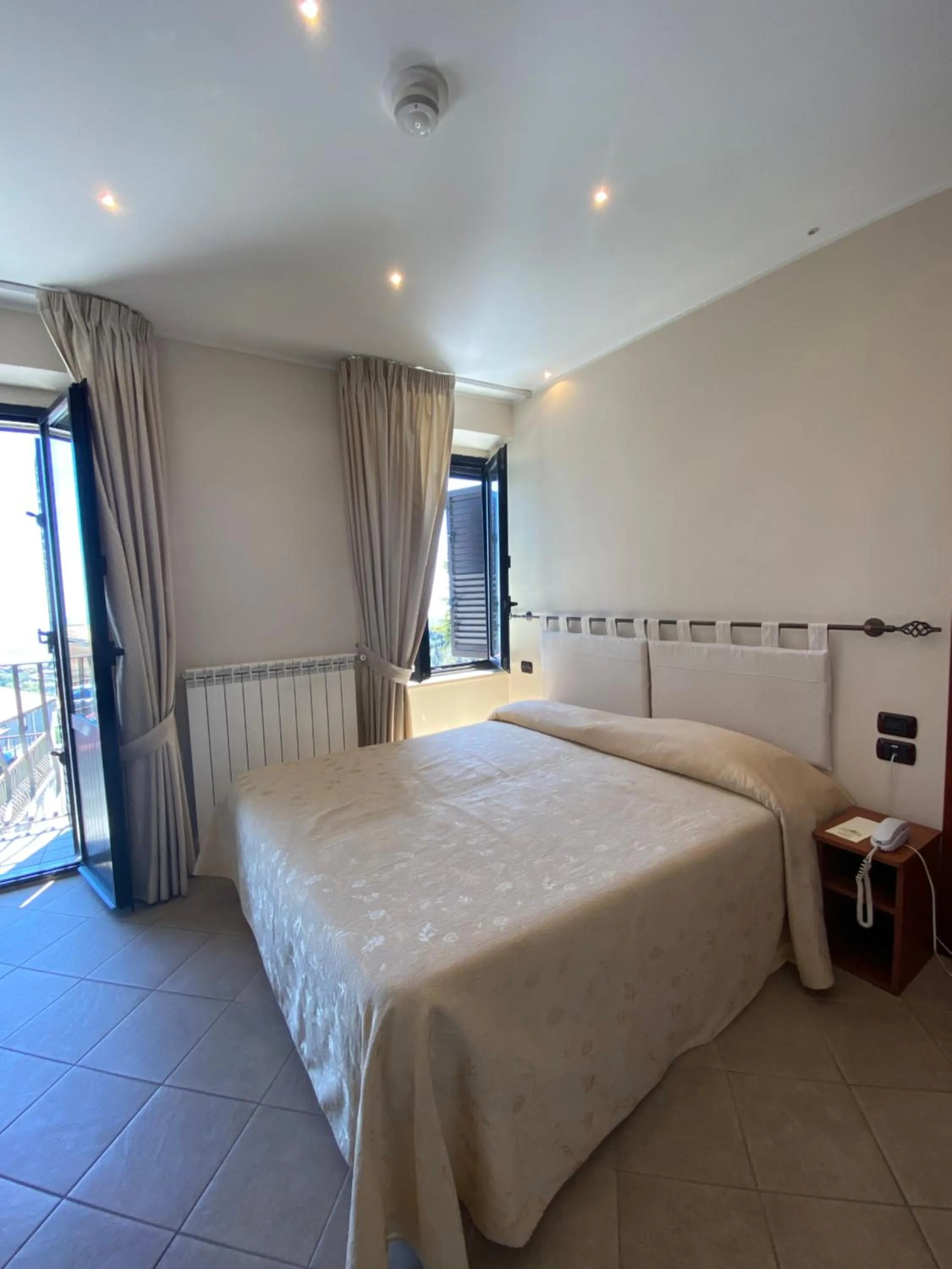 Bed in Hotel Residence Due Mari