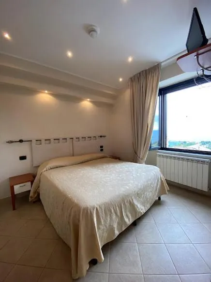 Bed in Hotel Residence Due Mari