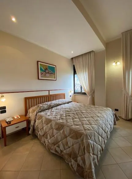 Bed in Hotel Residence Due Mari