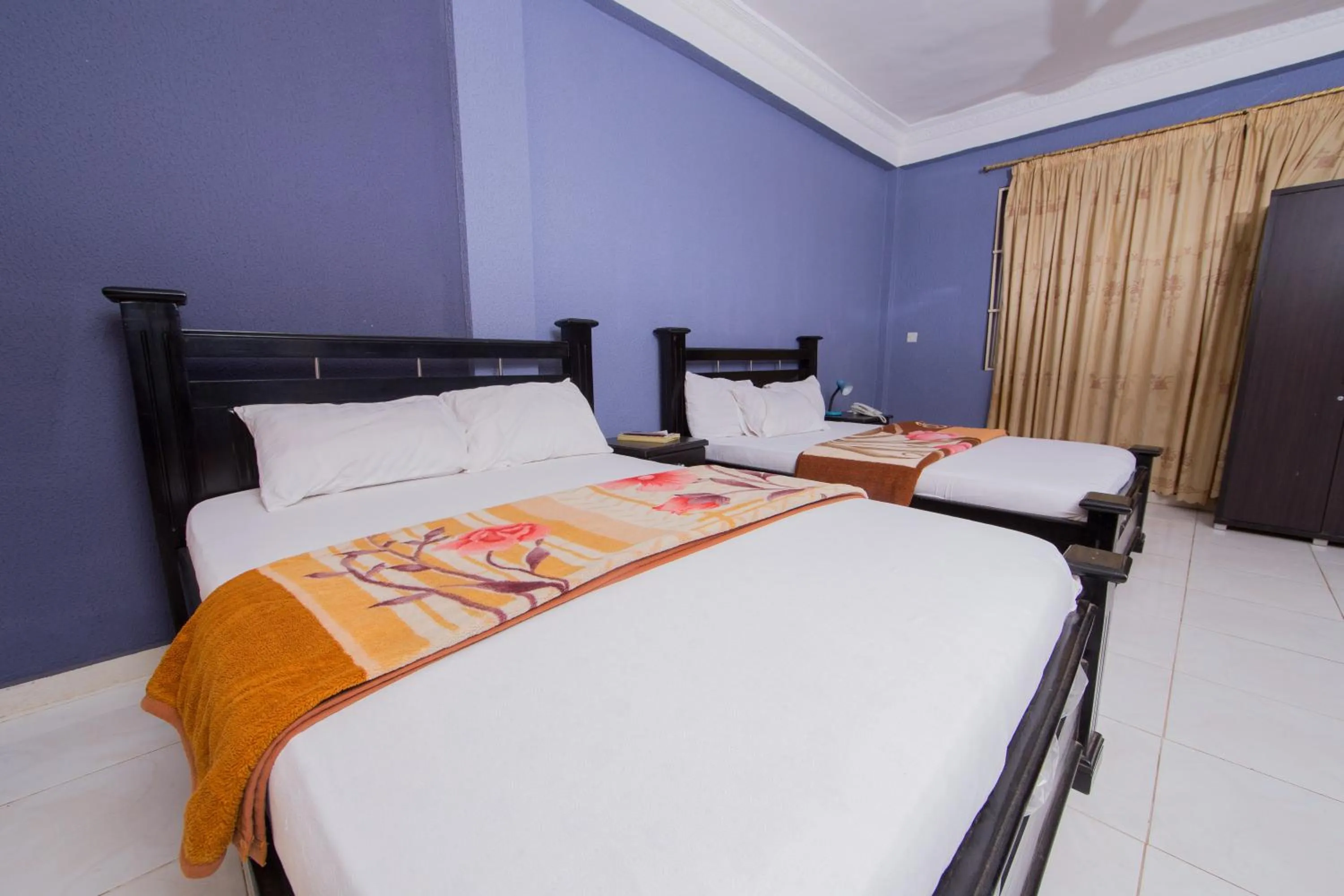 Bed in Pemicsa Hotel Accra