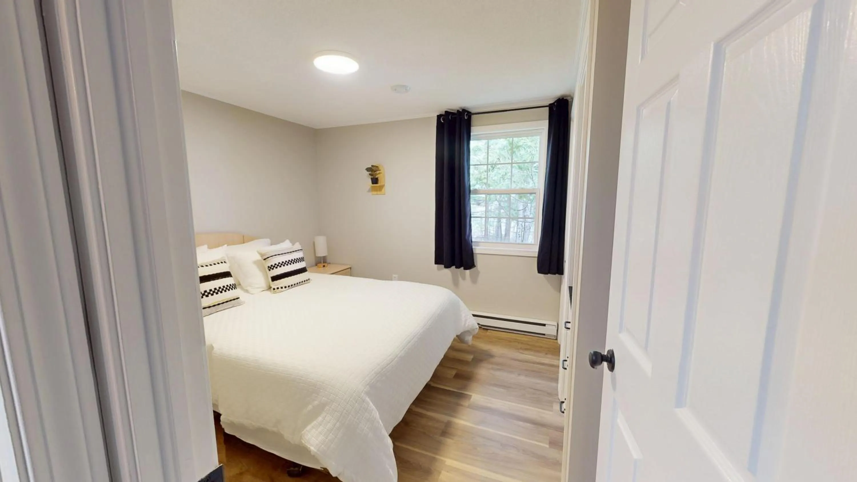 Bed in Lakeside Stays