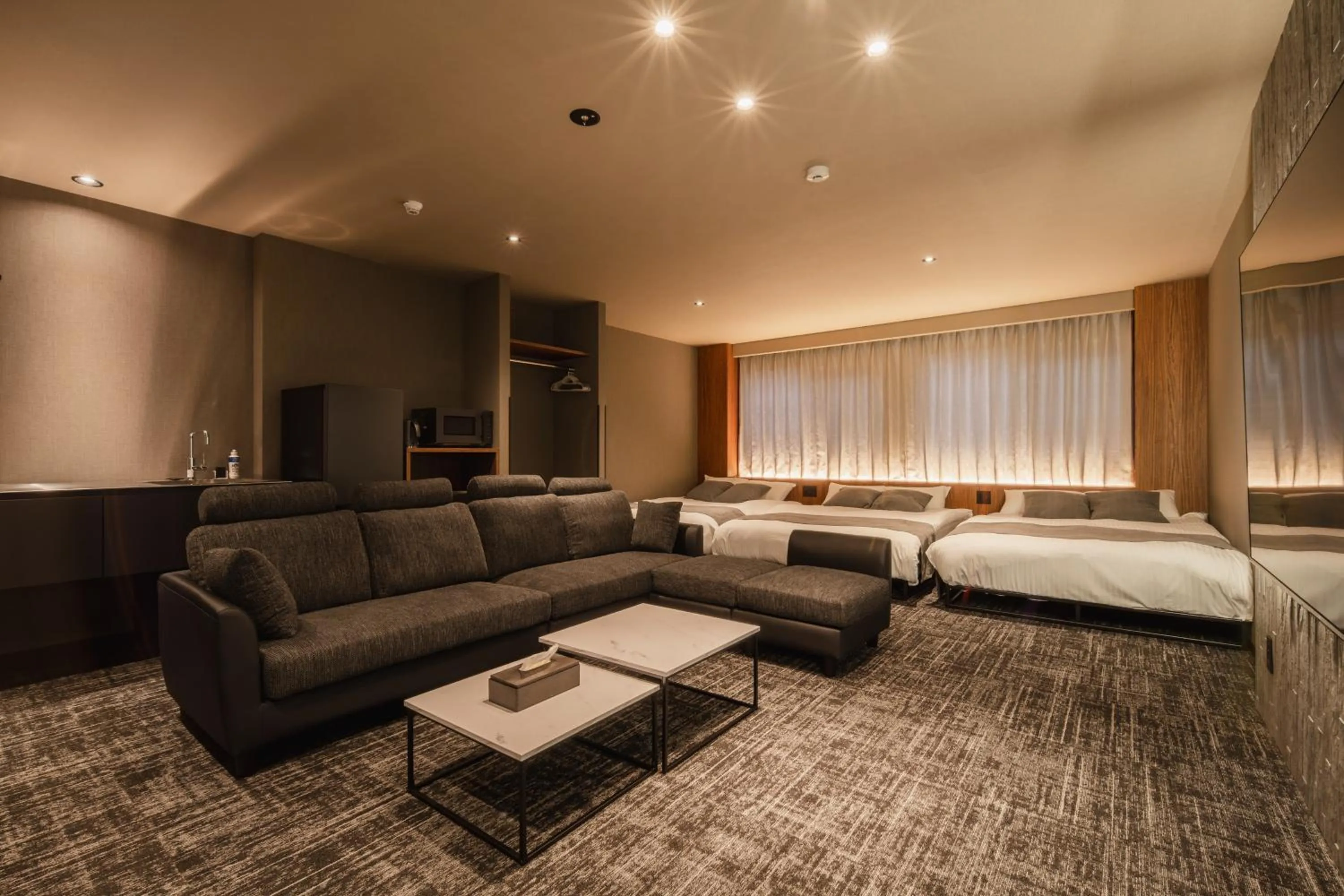 Living room, Bed in The LOFT INN HAKATA