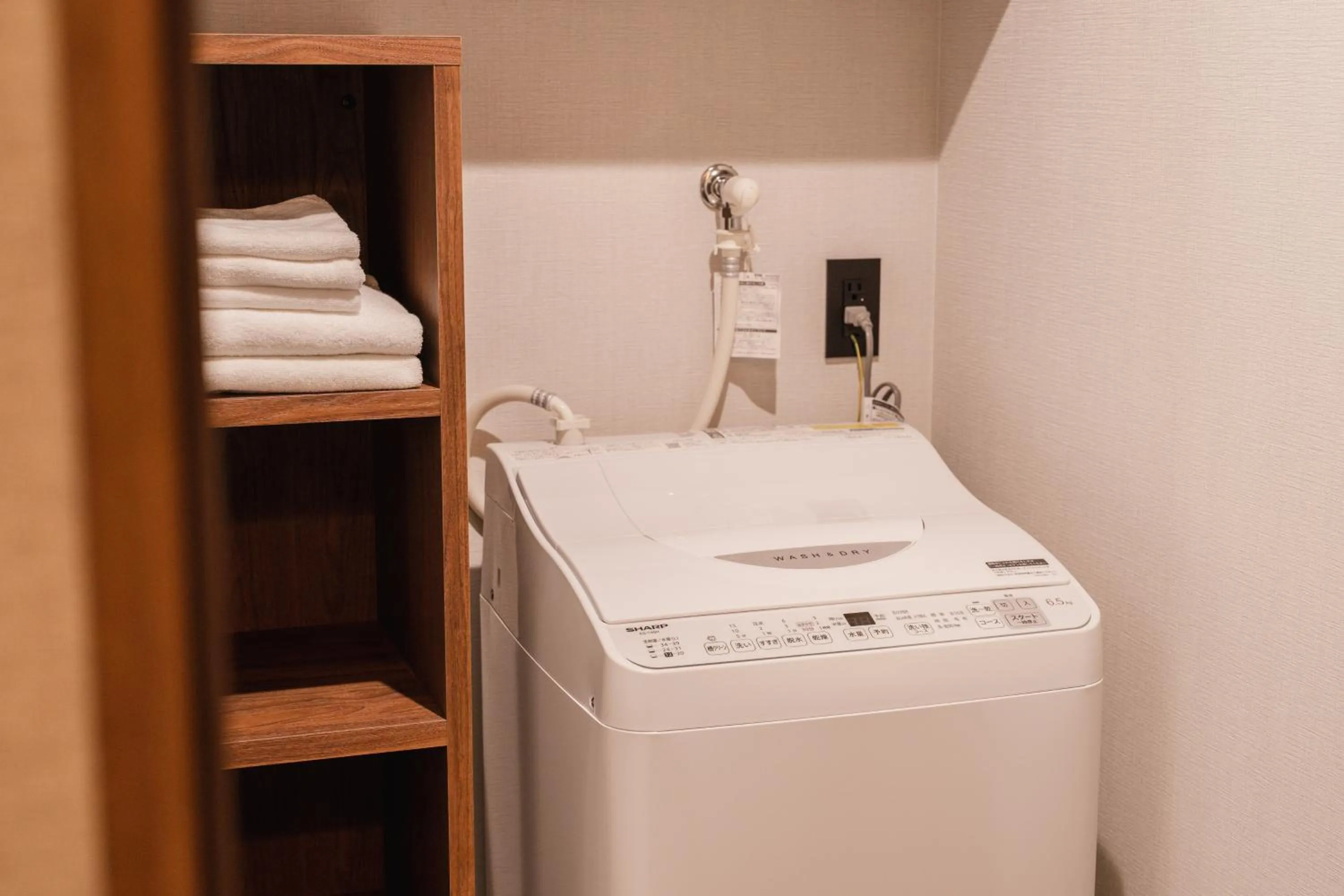 washing machine in The LOFT INN HAKATA