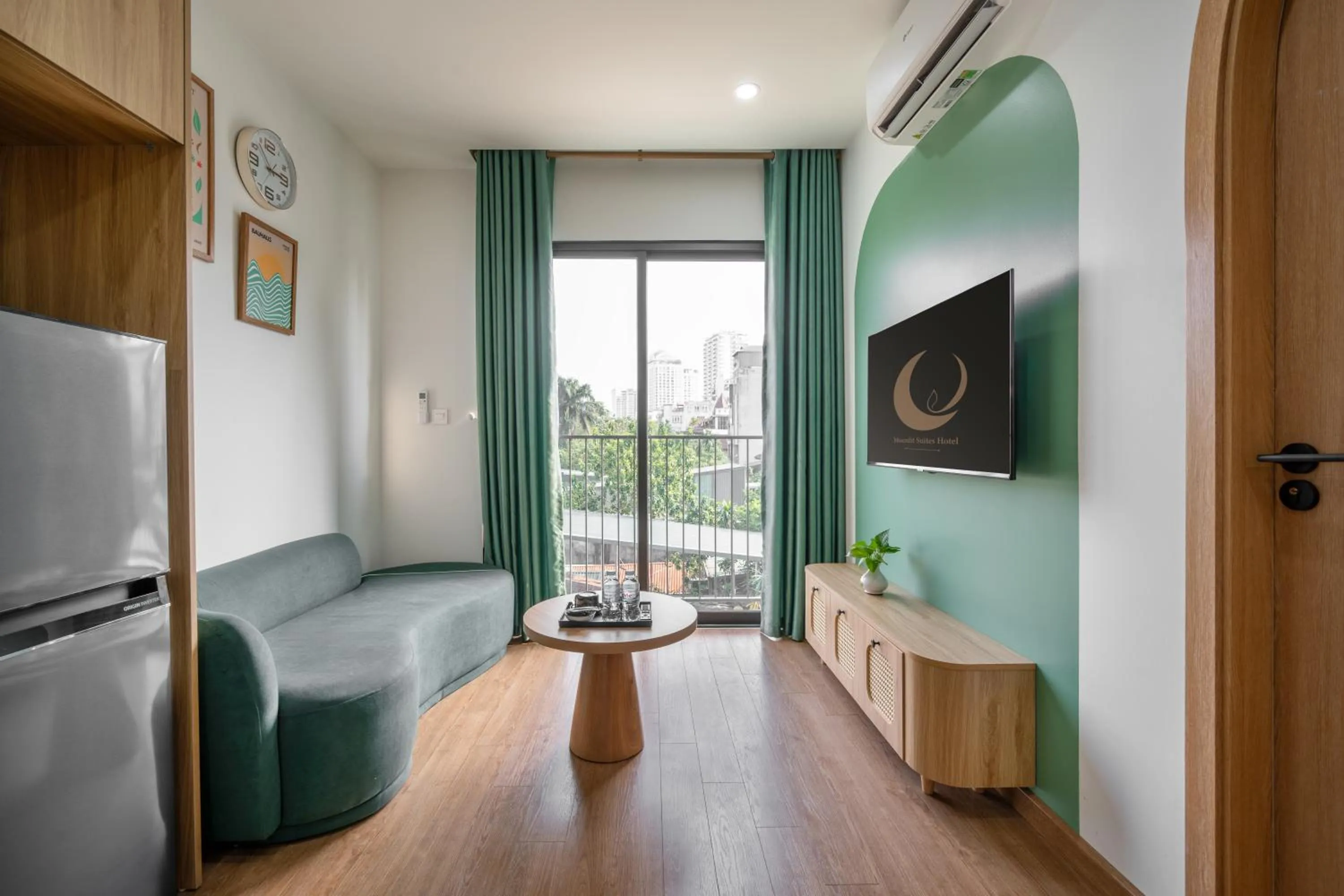 TV and multimedia in MOONLIT Suites Hotel by Luxe Paradise