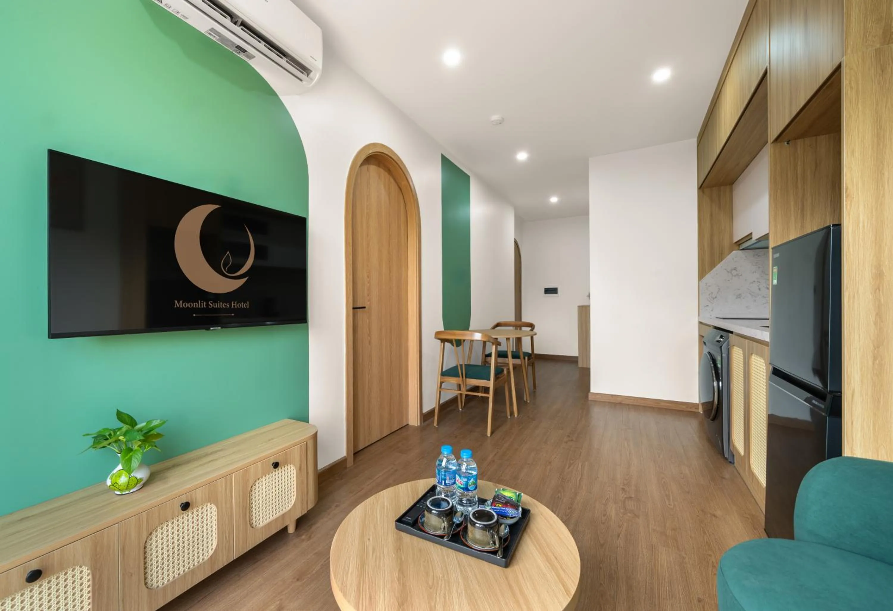 TV and multimedia in MOONLIT Suites Hotel by Luxe Paradise