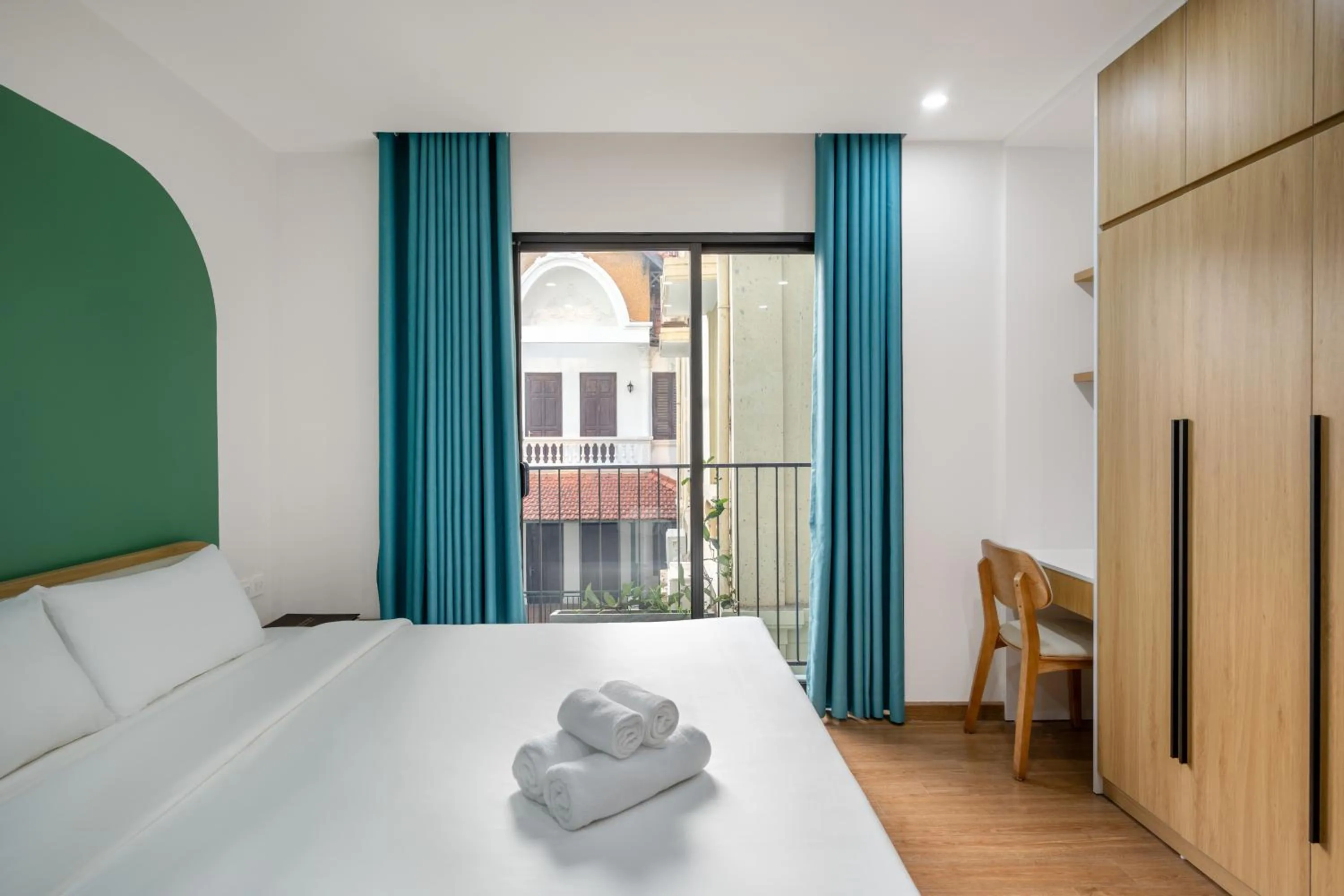 Bed in MOONLIT Suites Hotel by Luxe Paradise