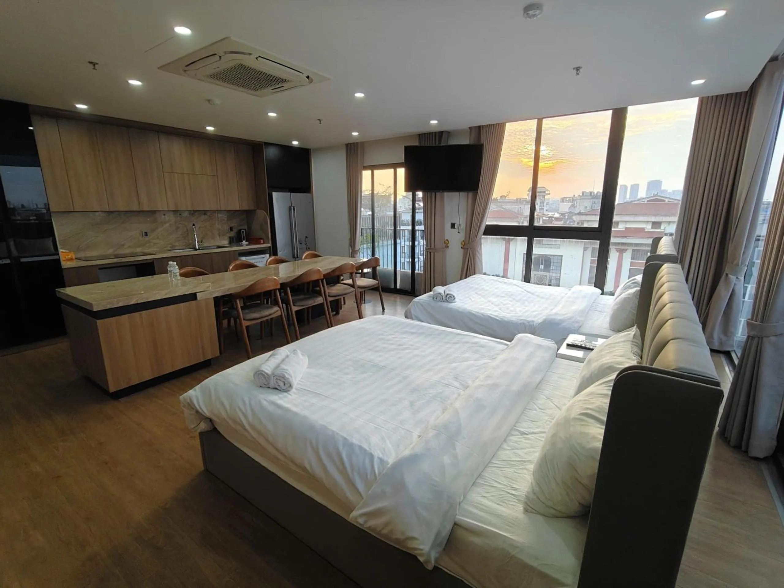 Photo of the whole room, Bed in MOONLIT Suites Hotel by Luxe Paradise