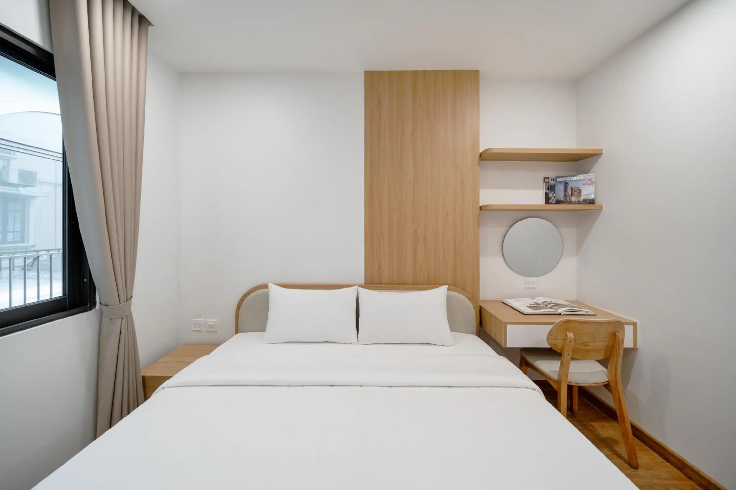 Bed in MOONLIT Suites Hotel by Luxe Paradise