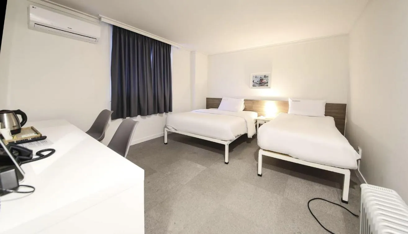 Bed in Gaon J Stay Hotel