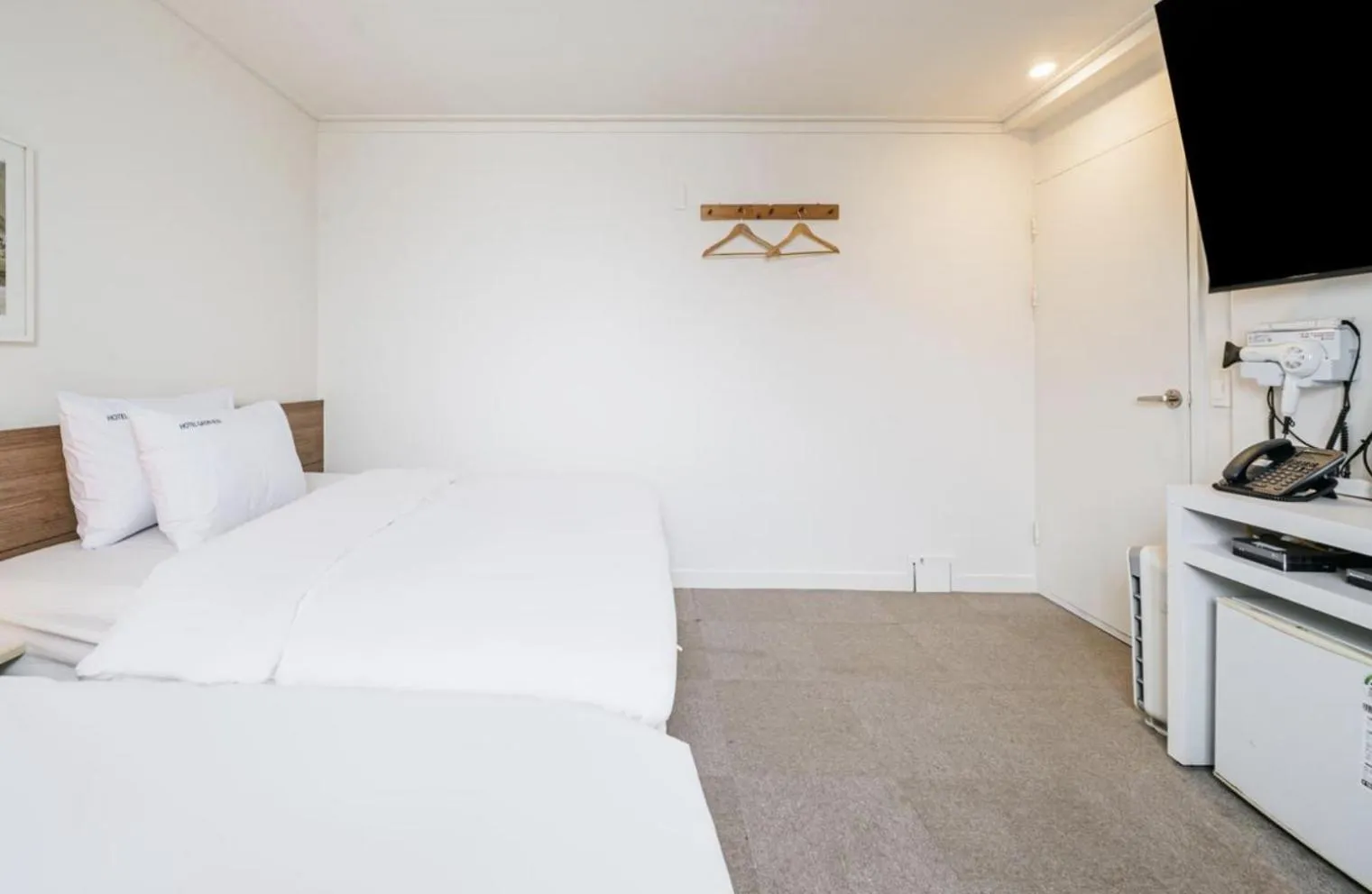 Bed in Gaon J Stay Hotel