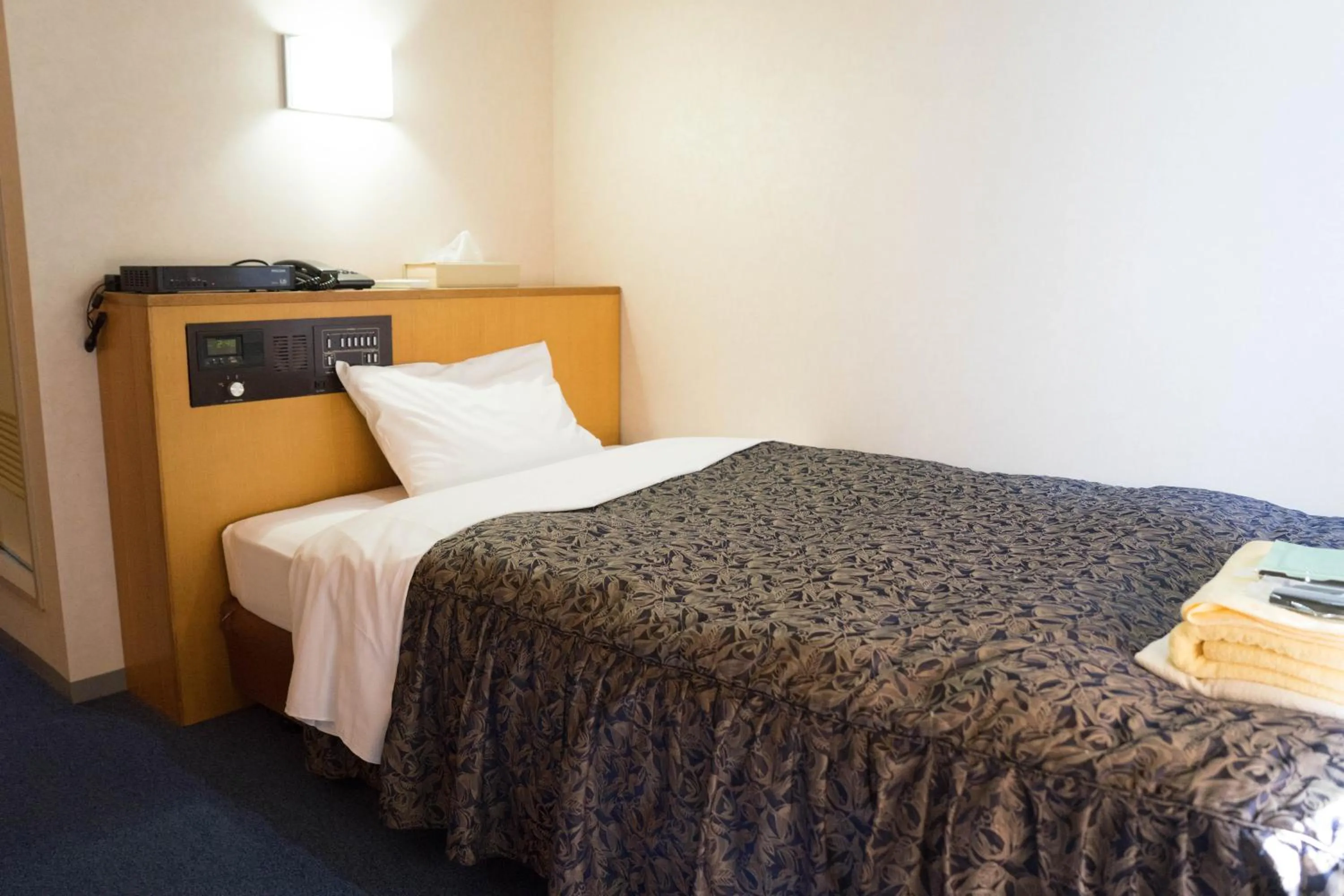 Bed in Sankei City Hotel Hachioji