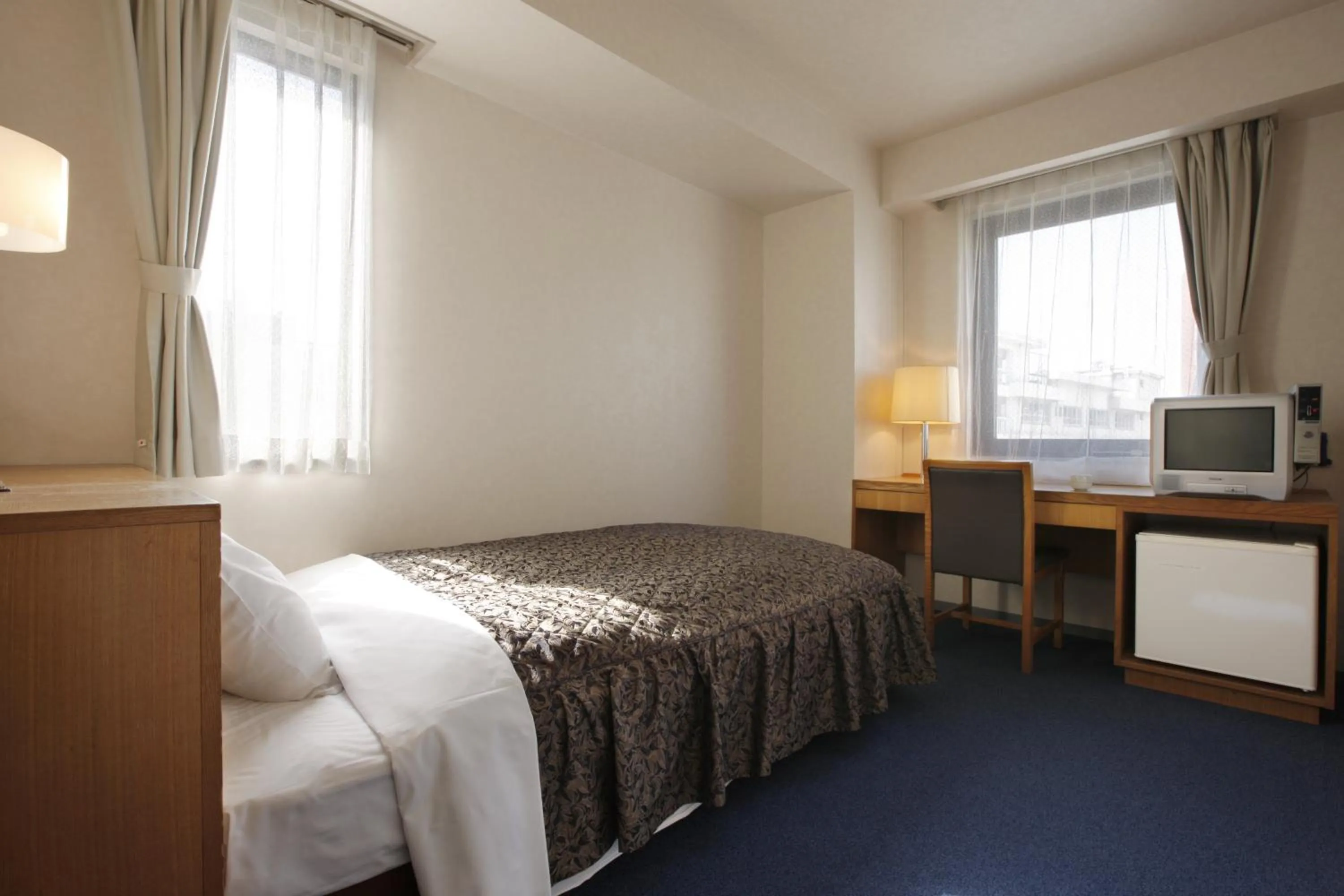 Bed in Sankei City Hotel Hachioji