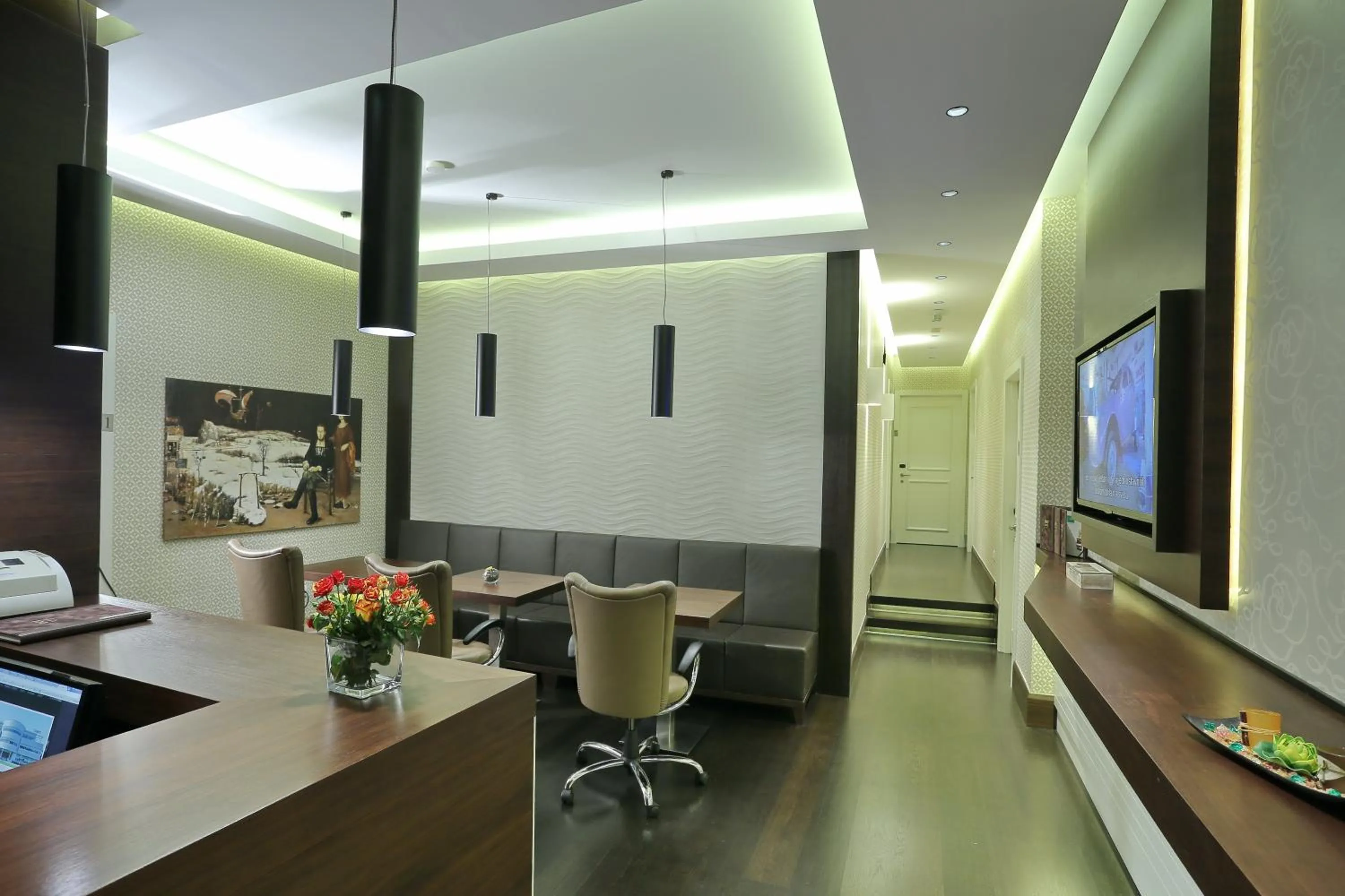 Communal lounge/ TV room in Belgreat Premium Suites